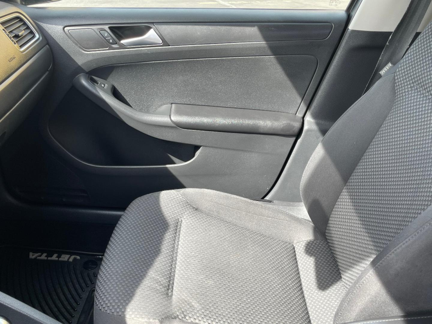 2014 Platinum Gray Metallic /Gray Cloth Volkswagen Jetta S (3VW2K7AJ7EM) with an 2.0L 4 Cyl. engine, Automatic transmission, located at 801 South State Street, Salt Lake City, UT, 84111, (801) 328-0098, 40.751953, -111.888206 - Life is crazy. Now is the time to buy! All of our prices are just dollars above our cost. These prices will change as soon as life isn't so crazy. So please call or come in. We are here to save you a lot of money! Our service department is OPEN DAILY to help with any of your service needs. P - Photo#14