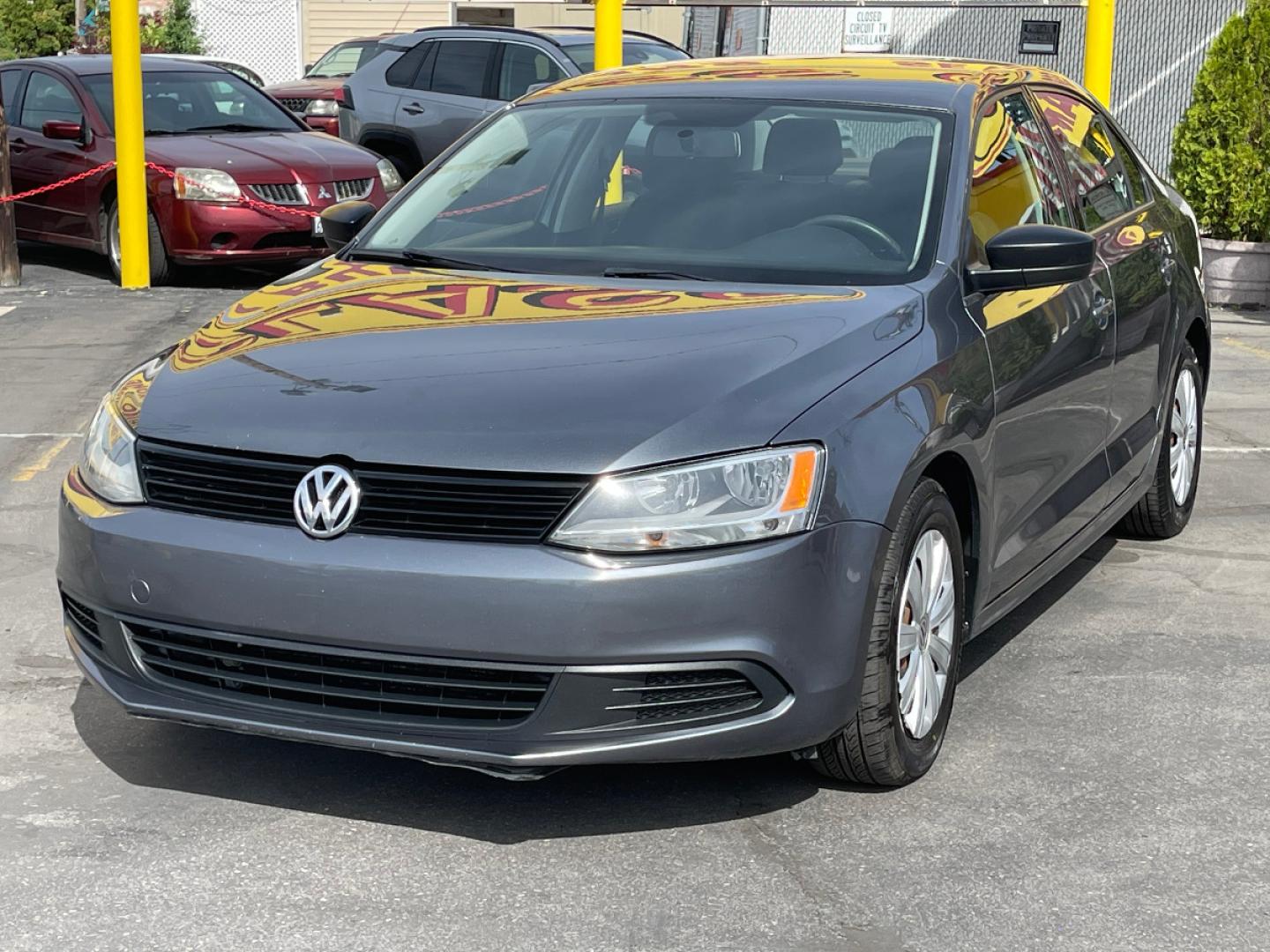 2014 Platinum Gray Metallic /Gray Cloth Volkswagen Jetta S (3VW2K7AJ7EM) with an 2.0L 4 Cyl. engine, Automatic transmission, located at 801 South State Street, Salt Lake City, UT, 84111, (801) 328-0098, 40.751953, -111.888206 - Life is crazy. Now is the time to buy! All of our prices are just dollars above our cost. These prices will change as soon as life isn't so crazy. So please call or come in. We are here to save you a lot of money! Our service department is OPEN DAILY to help with any of your service needs. P - Photo#2