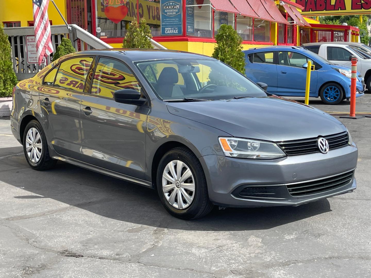 2014 Platinum Gray Metallic /Gray Cloth Volkswagen Jetta S (3VW2K7AJ7EM) with an 2.0L 4 Cyl. engine, Automatic transmission, located at 801 South State Street, Salt Lake City, UT, 84111, (801) 328-0098, 40.751953, -111.888206 - Life is crazy. Now is the time to buy! All of our prices are just dollars above our cost. These prices will change as soon as life isn't so crazy. So please call or come in. We are here to save you a lot of money! Our service department is OPEN DAILY to help with any of your service needs. P - Photo#4