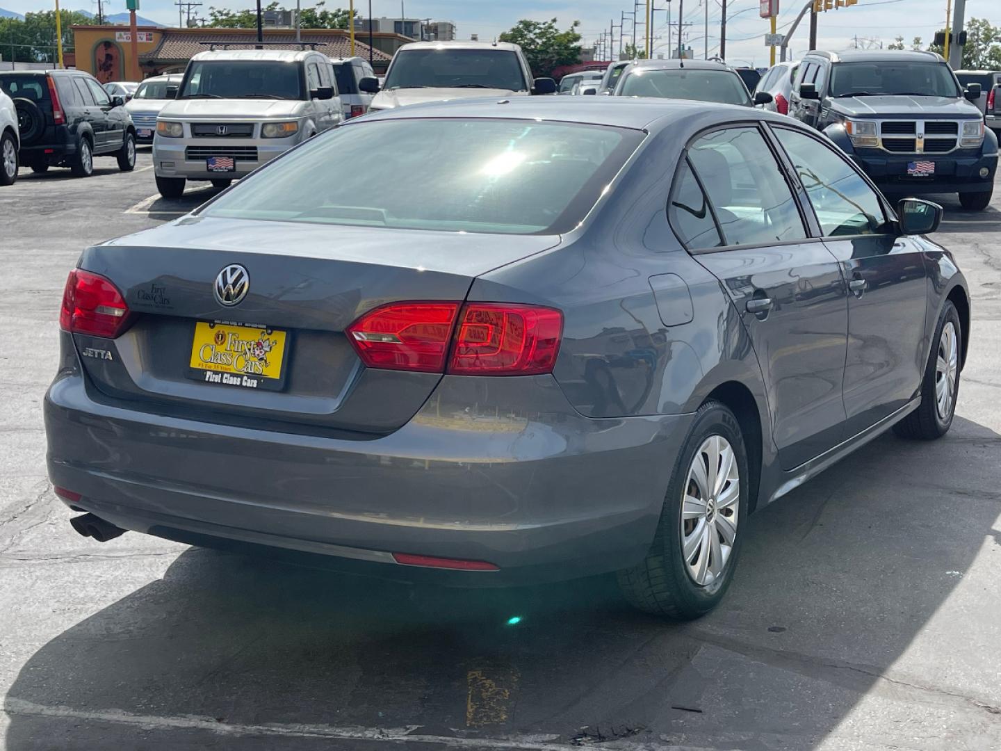 2014 Platinum Gray Metallic /Gray Cloth Volkswagen Jetta S (3VW2K7AJ7EM) with an 2.0L 4 Cyl. engine, Automatic transmission, located at 801 South State Street, Salt Lake City, UT, 84111, (801) 328-0098, 40.751953, -111.888206 - Life is crazy. Now is the time to buy! All of our prices are just dollars above our cost. These prices will change as soon as life isn't so crazy. So please call or come in. We are here to save you a lot of money! Our service department is OPEN DAILY to help with any of your service needs. P - Photo#6