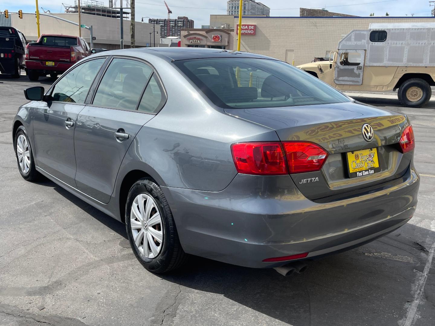 2014 Platinum Gray Metallic /Gray Cloth Volkswagen Jetta S (3VW2K7AJ7EM) with an 2.0L 4 Cyl. engine, Automatic transmission, located at 801 South State Street, Salt Lake City, UT, 84111, (801) 328-0098, 40.751953, -111.888206 - Life is crazy. Now is the time to buy! All of our prices are just dollars above our cost. These prices will change as soon as life isn't so crazy. So please call or come in. We are here to save you a lot of money! Our service department is OPEN DAILY to help with any of your service needs. P - Photo#8