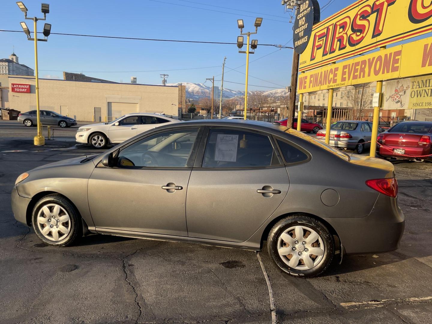 2008 Carbon Gray Metallic /Gray Cloth Hyundai Elantra GLS (KMHDU46D18U) with an 2.0L 4 Cyl. engine, Manual transmission, located at 801 South State Street, Salt Lake City, UT, 84111, (801) 328-0098, 40.751953, -111.888206 - Vehicle Features: GLS Model, ABS Brakes, Air Conditioning, AM/FM Stereo, Auxiliary Audio Input, CD Audio, Cloth Seats, Cruise Control, Manual Transmission, Overhead Airbags, Power Locks, Power Mirrors, Power Windows, Rear Defroster, Satellite Radio Ready, Side Airbags. Our service department is O - Photo#4