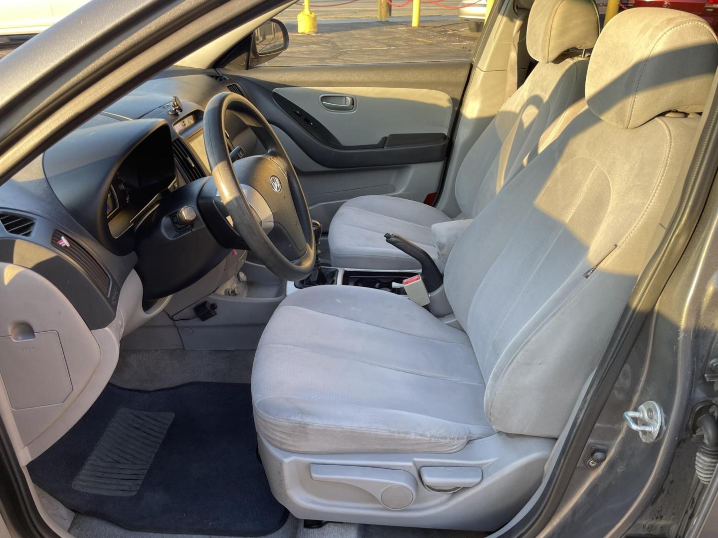 2008 Carbon Gray Metallic /Gray Cloth Hyundai Elantra GLS (KMHDU46D18U) with an 2.0L 4 Cyl. engine, Manual transmission, located at 801 South State Street, Salt Lake City, UT, 84111, (801) 328-0098, 40.751953, -111.888206 - Vehicle Features: GLS Model, ABS Brakes, Air Conditioning, AM/FM Stereo, Auxiliary Audio Input, CD Audio, Cloth Seats, Cruise Control, Manual Transmission, Overhead Airbags, Power Locks, Power Mirrors, Power Windows, Rear Defroster, Satellite Radio Ready, Side Airbags. Our service department is O - Photo#8