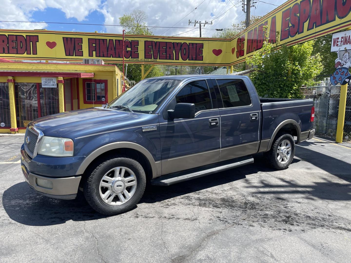 2004 True Blue Metallic /Tan Leather Ford F-150 Lariat SuperCrew (1FTPW12504K) with an 5.4L V8 engine, Automatic transmission, located at 801 South State Street, Salt Lake City, UT, 84111, (801) 328-0098, 40.751953, -111.888206 - Vehicle Features: Lariat Model, SuperCrew 4 Door, ABS Brakes, Traction Control, Cruise Control, Air Conditioning, AM/FM Stereo, CD Player, Leather Interior, Power Windows, Power Locks, Power Mirrors, Heated Seats, Power Seat(s), Privacy Glass, Tow Package, Running Boards, Alloy Wheels, Bedliner - Photo#0