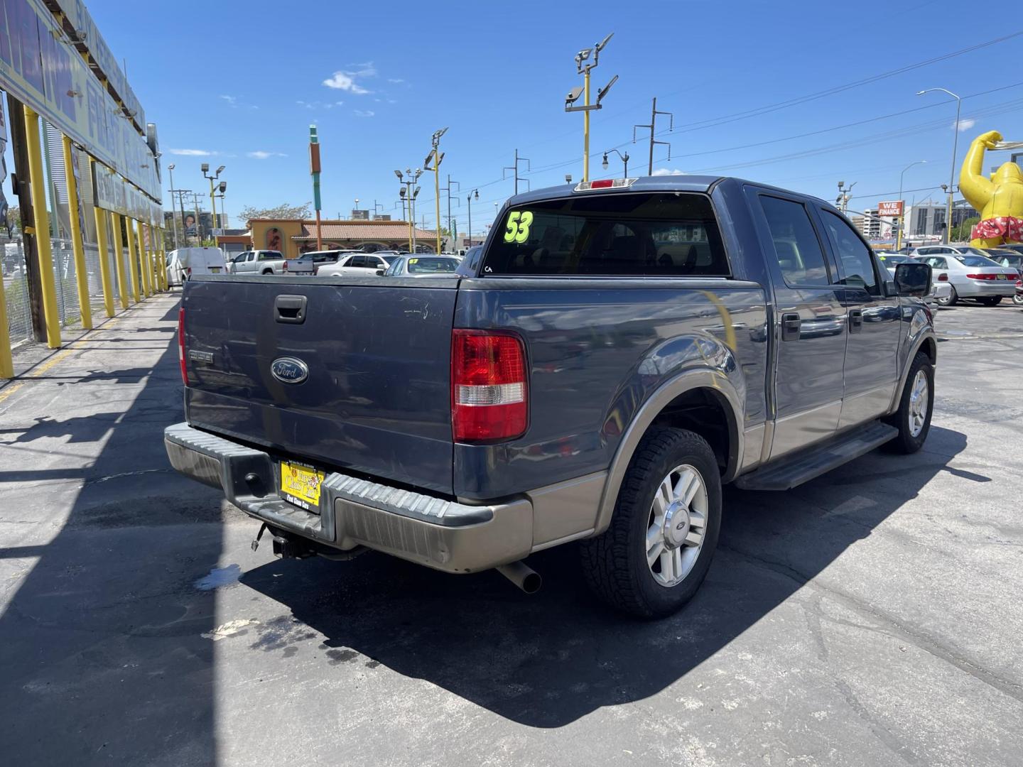 2004 True Blue Metallic /Tan Leather Ford F-150 Lariat SuperCrew (1FTPW12504K) with an 5.4L V8 engine, Automatic transmission, located at 801 South State Street, Salt Lake City, UT, 84111, (801) 328-0098, 40.751953, -111.888206 - Vehicle Features: Lariat Model, SuperCrew 4 Door, ABS Brakes, Traction Control, Cruise Control, Air Conditioning, AM/FM Stereo, CD Player, Leather Interior, Power Windows, Power Locks, Power Mirrors, Heated Seats, Power Seat(s), Privacy Glass, Tow Package, Running Boards, Alloy Wheels, Bedliner - Photo#5