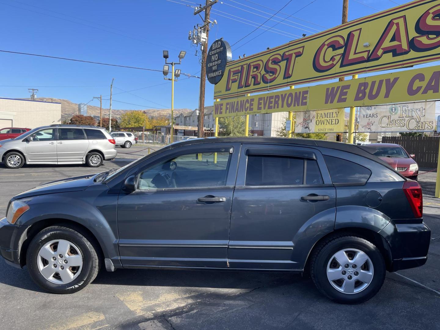 2007 Steel Blue Metallic /Gray Cloth Dodge Caliber SE (1B3HB28B37D) with an 2.0L 4 Cyl. engine, Automatic transmission, located at 801 South State Street, Salt Lake City, UT, 84111, (801) 328-0098, 40.751953, -111.888206 - Vehicle Features: AM/FM/CD, AUX INPUT, AUTOMATIC, BLUETOOTH RADIO, POWER WINDOWS, POWER LOCKS, HATCHBACK, 2.0 LITER 4 CYLINDER, CLEAN TITLE, POWER BRAKES, POWER STEERING, 4 DOOR, CLOTH INTERIOR, DEFROST Our service department is OPEN DAILY to help with any of your service needs. Please call for - Photo#8