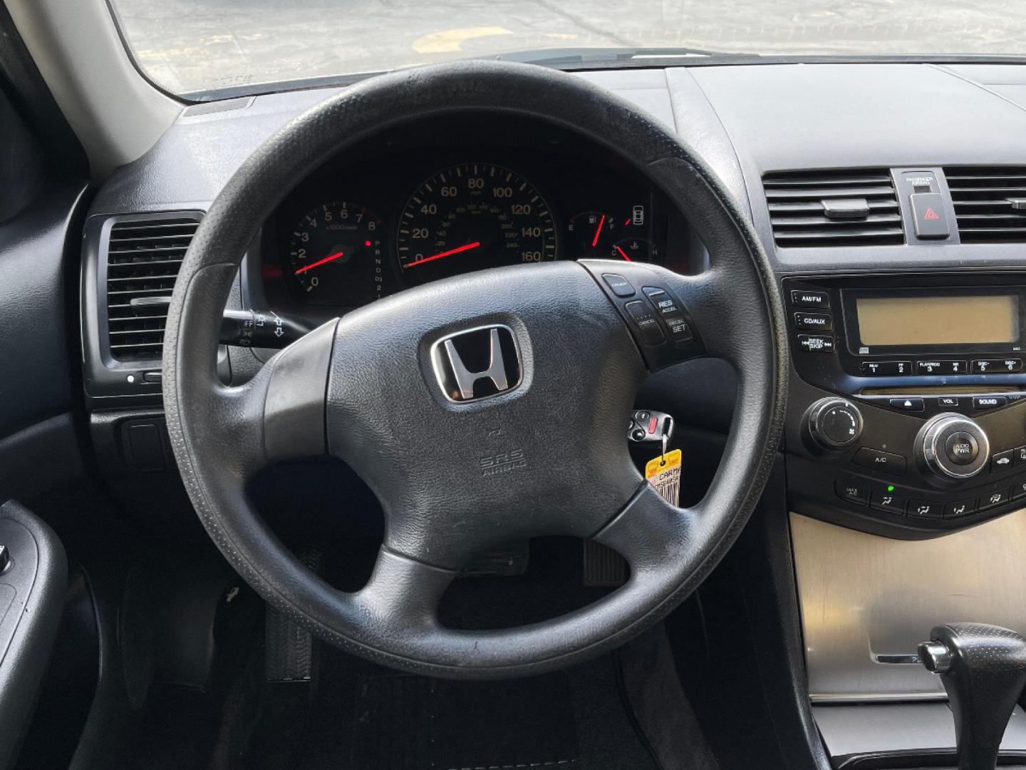 2005 Satin Silver Metallic /Gray Cloth Honda Accord LX (1HGCM56405A) with an 2.4L 4 Cyl. engine, Automatic transmission, located at 801 South State Street, Salt Lake City, UT, 84111, (801) 328-0098, 40.751953, -111.888206 - *MILEAGE DISCREPANCY ACCORDING TO CARFAX REPORT! TRUE MILES UNKNOWN!* Life is crazy. Now is the time to buy! All of our prices are just dollars above our cost. These prices will change as soon as life isn't so crazy. So please call or come in. We are here to save you a lot of money! Our s - Photo#15