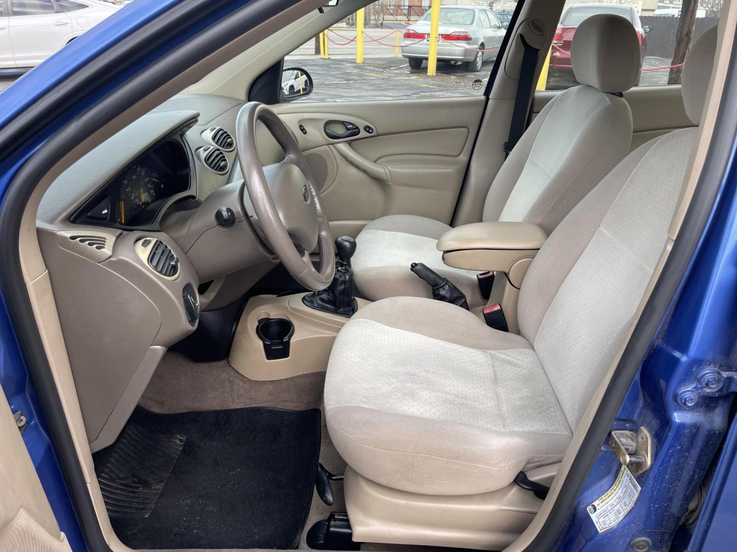 2004 French Blue Metallic /Gray Cloth Ford Focus ZTS (1FAFP38Z04W) with an 2.3L 4 Cyl. engine, Manual transmission, located at 801 South State Street, Salt Lake City, UT, 84111, (801) 328-0098, 40.751953, -111.888206 - Vehicle Features: ABS Brakes, Air Conditioning, Alloy Wheels, AM/FM Stereo, CD Audio, Cloth Seats, Cruise Control, Manual Transmission, Power Locks, Power Mirrors, Power Windows, Rear Defroster, Sunroof(s), Traction Control All advertised prices are just dollars above cost to make room for new in - Photo#9