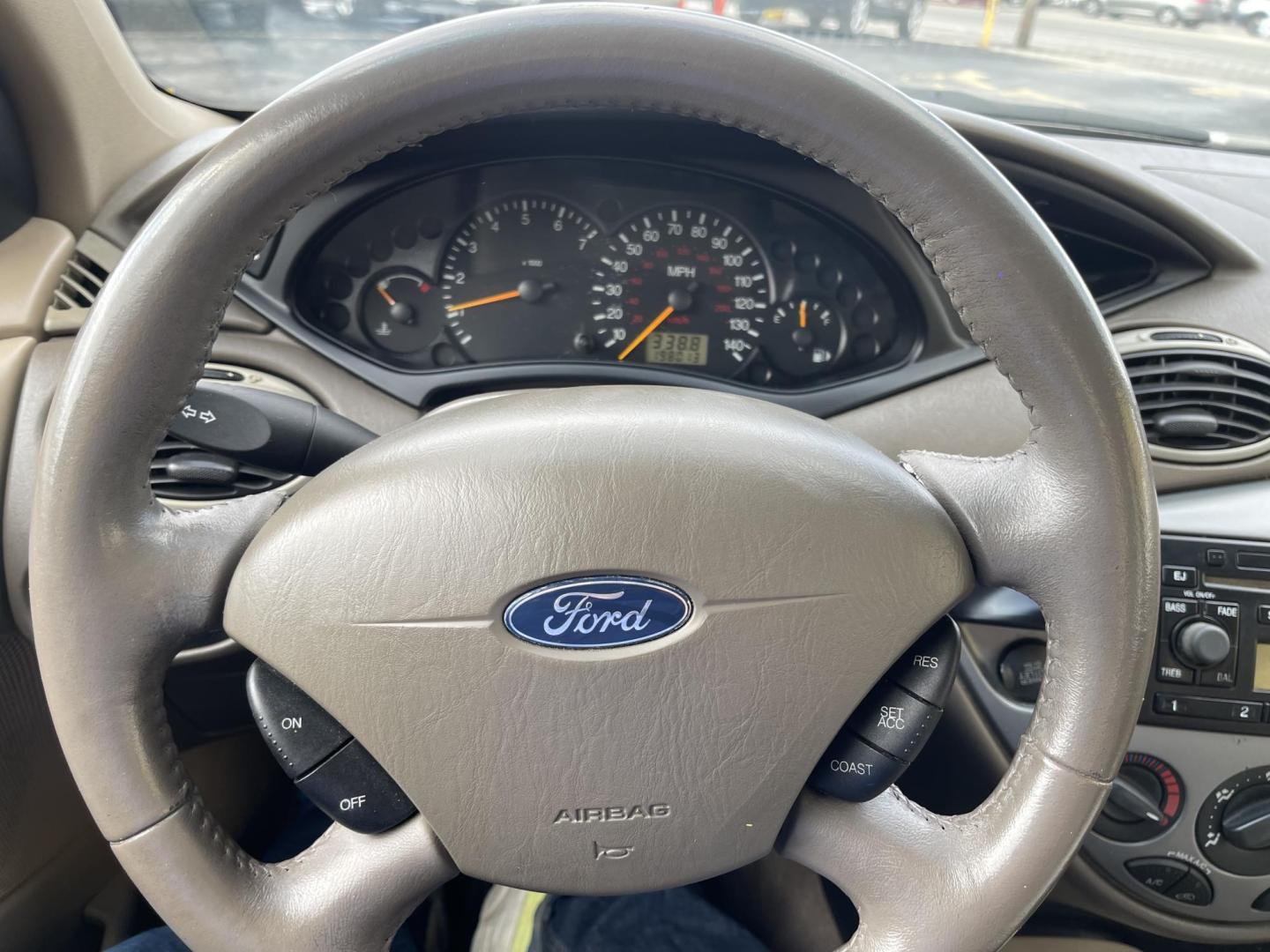 2004 French Blue Metallic /Gray Cloth Ford Focus ZTS (1FAFP38Z04W) with an 2.3L 4 Cyl. engine, Manual transmission, located at 801 South State Street, Salt Lake City, UT, 84111, (801) 328-0098, 40.751953, -111.888206 - Vehicle Features: ABS Brakes, Air Conditioning, Alloy Wheels, AM/FM Stereo, CD Audio, Cloth Seats, Cruise Control, Manual Transmission, Power Locks, Power Mirrors, Power Windows, Rear Defroster, Sunroof(s), Traction Control All advertised prices are just dollars above cost to make room for new in - Photo#14