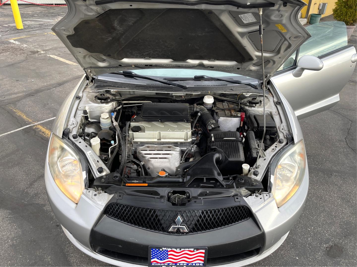 2012 Quick Silver Pearl /Gray Cloth Mitsubishi Eclipse GS Sport (4A31K5DF5CE) with an 2.4L 4 Cyl. engine, Automatic transmission, located at 801 South State Street, Salt Lake City, UT, 84111, (801) 328-0098, 40.751953, -111.888206 - Life is crazy. Now is the time to buy! All of our prices are just dollars above our cost. These prices will change as soon as life isn't so crazy. So please call or come in. We are here to save you a lot of money! Our service department is OPEN DAILY to help with any of your service needs. P - Photo#10