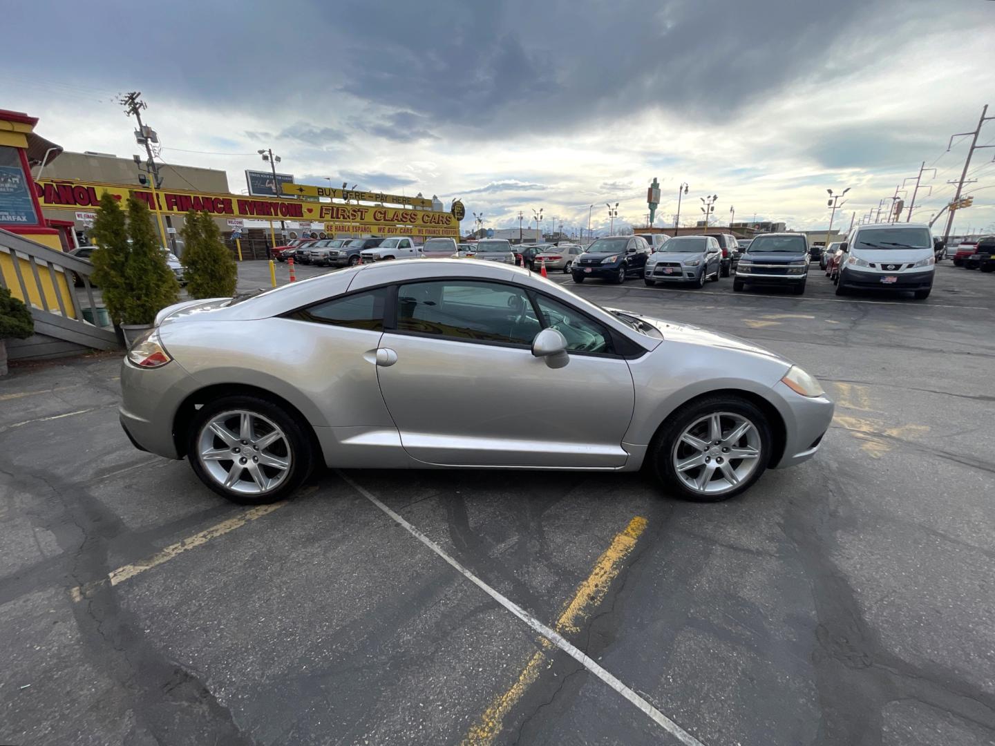 2012 Quick Silver Pearl /Gray Cloth Mitsubishi Eclipse GS Sport (4A31K5DF5CE) with an 2.4L 4 Cyl. engine, Automatic transmission, located at 801 South State Street, Salt Lake City, UT, 84111, (801) 328-0098, 40.751953, -111.888206 - Life is crazy. Now is the time to buy! All of our prices are just dollars above our cost. These prices will change as soon as life isn't so crazy. So please call or come in. We are here to save you a lot of money! Our service department is OPEN DAILY to help with any of your service needs. P - Photo#2