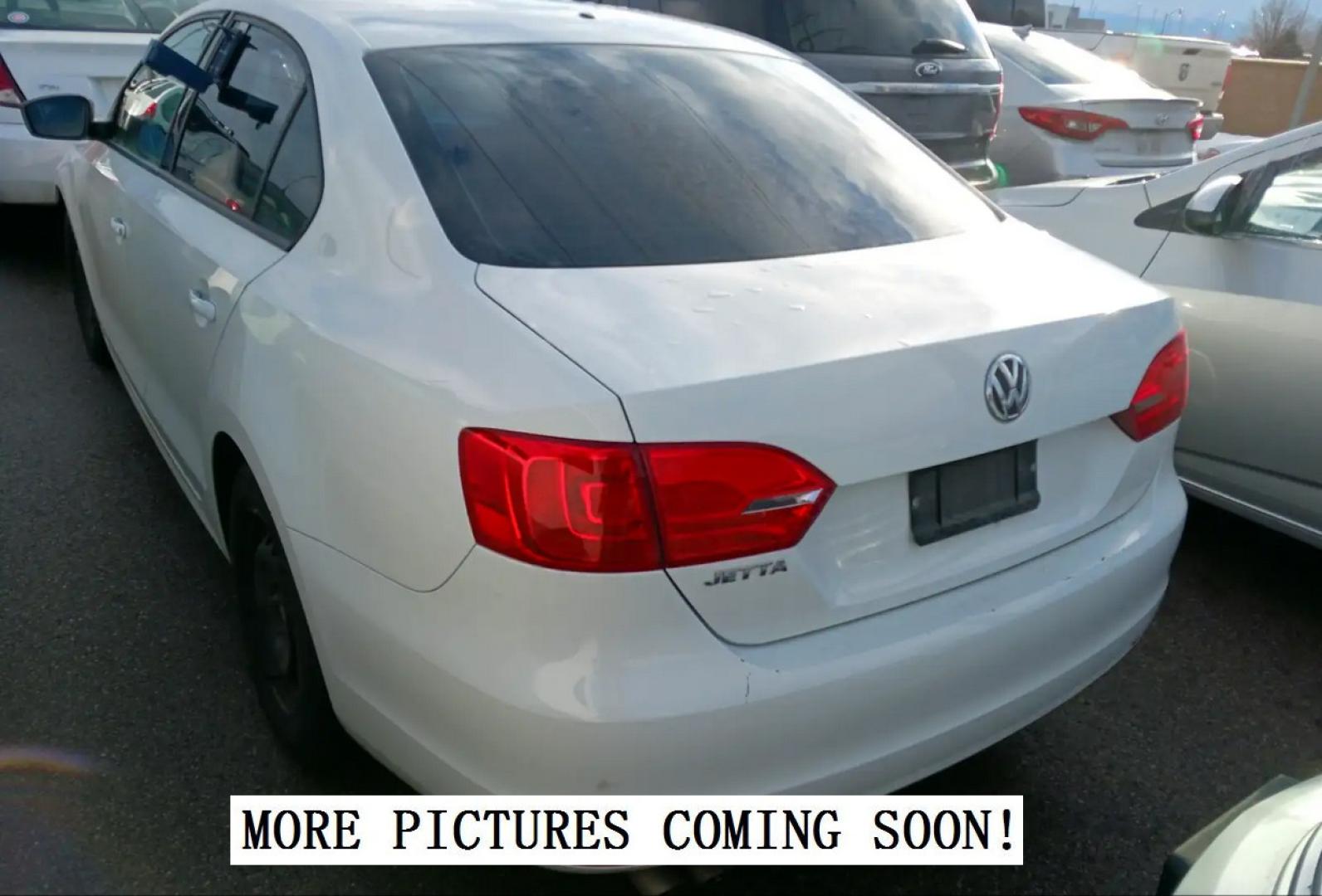 2014 Pure White /Gray Cloth Volkswagen Jetta S (3VW2K7AJ6EM) with an 2.0L 4 Cyl. engine, Automatic transmission, located at 801 South State Street, Salt Lake City, UT, 84111, (801) 328-0098, 40.751953, -111.888206 - Life is crazy. Now is the time to buy! All of our prices are just dollars above our cost. These prices will change as soon as life isn't so crazy. So please call or come in. We are here to save you a lot of money! Our service department is OPEN DAILY to help with any of your service needs. P - Photo#1