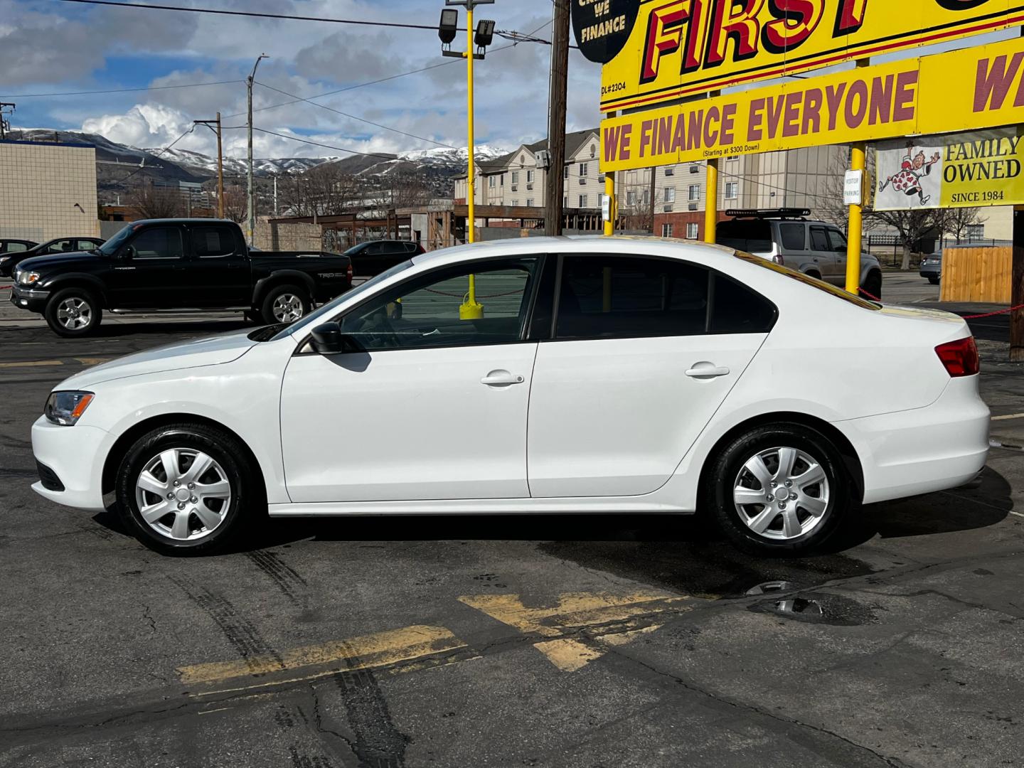 2014 Pure White /Gray Cloth Volkswagen Jetta S (3VW2K7AJ6EM) with an 2.0L 4 Cyl. engine, Automatic transmission, located at 801 South State Street, Salt Lake City, UT, 84111, (801) 328-0098, 40.751953, -111.888206 - Life is crazy. Now is the time to buy! All of our prices are just dollars above our cost. These prices will change as soon as life isn't so crazy. So please call or come in. We are here to save you a lot of money! Our service department is OPEN DAILY to help with any of your service needs. P - Photo#2