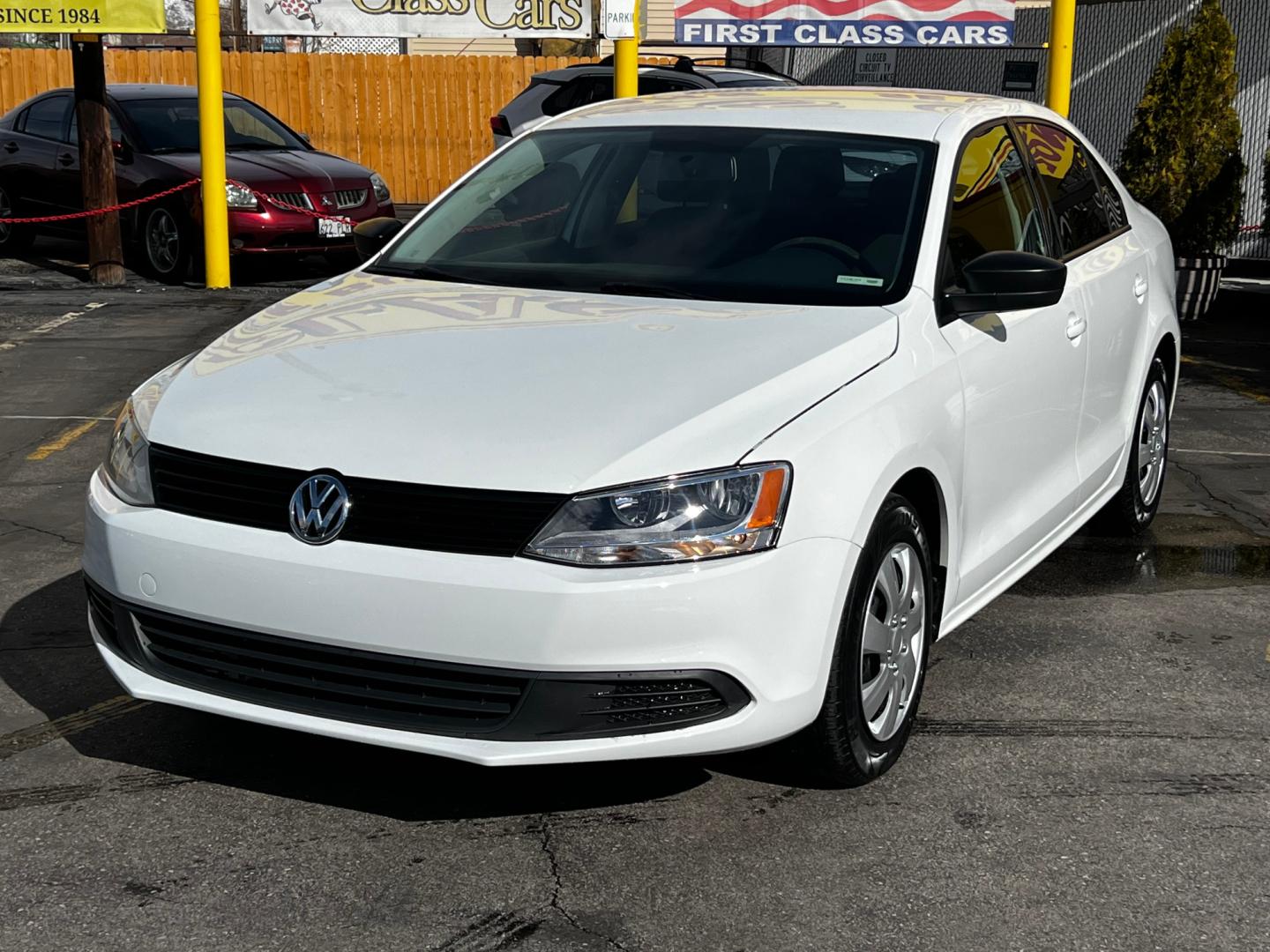 2014 Pure White /Gray Cloth Volkswagen Jetta S (3VW2K7AJ6EM) with an 2.0L 4 Cyl. engine, Automatic transmission, located at 801 South State Street, Salt Lake City, UT, 84111, (801) 328-0098, 40.751953, -111.888206 - Life is crazy. Now is the time to buy! All of our prices are just dollars above our cost. These prices will change as soon as life isn't so crazy. So please call or come in. We are here to save you a lot of money! Our service department is OPEN DAILY to help with any of your service needs. P - Photo#0