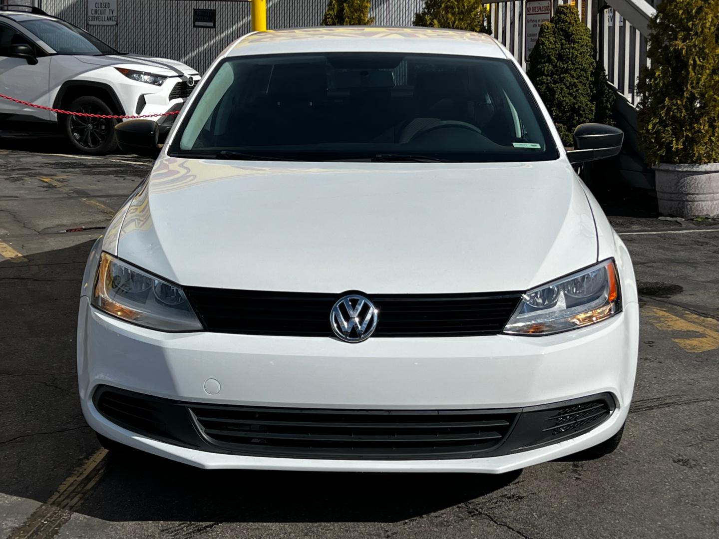 2014 Pure White /Gray Cloth Volkswagen Jetta S (3VW2K7AJ6EM) with an 2.0L 4 Cyl. engine, Automatic transmission, located at 801 South State Street, Salt Lake City, UT, 84111, (801) 328-0098, 40.751953, -111.888206 - Life is crazy. Now is the time to buy! All of our prices are just dollars above our cost. These prices will change as soon as life isn't so crazy. So please call or come in. We are here to save you a lot of money! Our service department is OPEN DAILY to help with any of your service needs. P - Photo#4