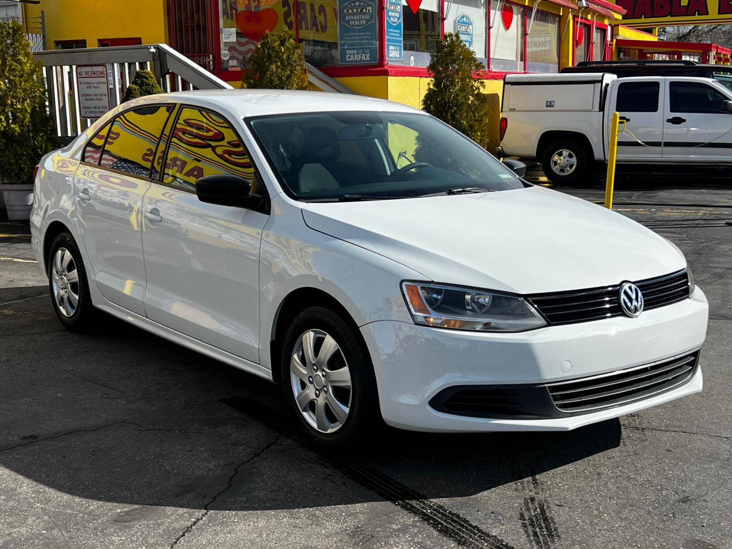 2014 Pure White /Gray Cloth Volkswagen Jetta S (3VW2K7AJ6EM) with an 2.0L 4 Cyl. engine, Automatic transmission, located at 801 South State Street, Salt Lake City, UT, 84111, (801) 328-0098, 40.751953, -111.888206 - Life is crazy. Now is the time to buy! All of our prices are just dollars above our cost. These prices will change as soon as life isn't so crazy. So please call or come in. We are here to save you a lot of money! Our service department is OPEN DAILY to help with any of your service needs. P - Photo#5