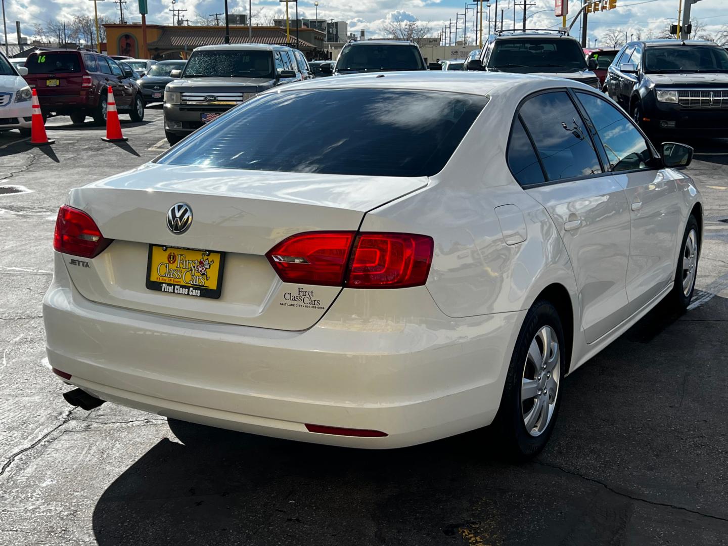 2014 Pure White /Gray Cloth Volkswagen Jetta S (3VW2K7AJ6EM) with an 2.0L 4 Cyl. engine, Automatic transmission, located at 801 South State Street, Salt Lake City, UT, 84111, (801) 328-0098, 40.751953, -111.888206 - Life is crazy. Now is the time to buy! All of our prices are just dollars above our cost. These prices will change as soon as life isn't so crazy. So please call or come in. We are here to save you a lot of money! Our service department is OPEN DAILY to help with any of your service needs. P - Photo#7