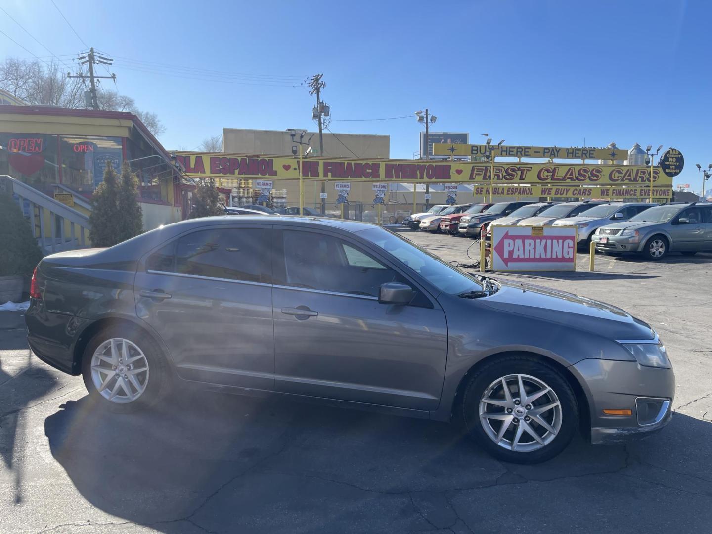 2012 Sterling Gray Metallic /Black Leather Ford Fusion SEL (3FAHP0JA4CR) with an 2.5L 4 Cyl. engine, Automatic transmission, located at 801 South State Street, Salt Lake City, UT, 84111, (801) 328-0098, 40.751953, -111.888206 - Life is crazy. Now is the time to buy! All of our prices are just dollars above our cost. These prices will change as soon as life isn't so crazy. So please call or come in. We are here to save you a lot of money! Our service department is OPEN DAILY to help with any of your service needs. P - Photo#4