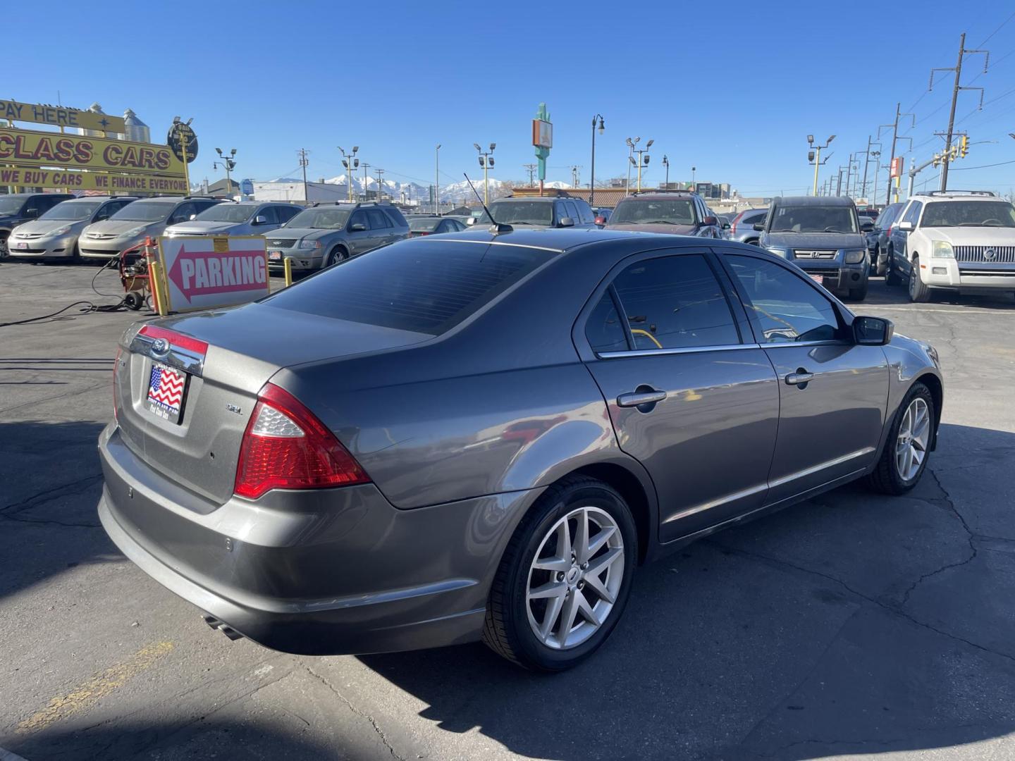 2012 Sterling Gray Metallic /Black Leather Ford Fusion SEL (3FAHP0JA4CR) with an 2.5L 4 Cyl. engine, Automatic transmission, located at 801 South State Street, Salt Lake City, UT, 84111, (801) 328-0098, 40.751953, -111.888206 - Life is crazy. Now is the time to buy! All of our prices are just dollars above our cost. These prices will change as soon as life isn't so crazy. So please call or come in. We are here to save you a lot of money! Our service department is OPEN DAILY to help with any of your service needs. P - Photo#5