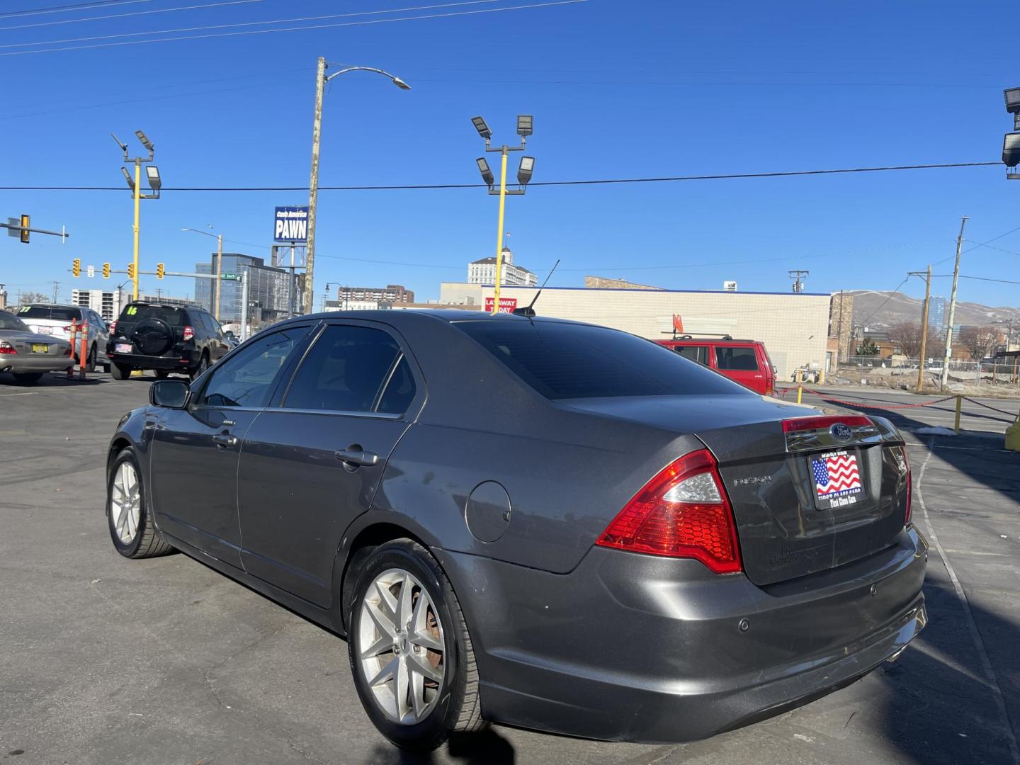 2012 Sterling Gray Metallic /Black Leather Ford Fusion SEL (3FAHP0JA4CR) with an 2.5L 4 Cyl. engine, Automatic transmission, located at 801 South State Street, Salt Lake City, UT, 84111, (801) 328-0098, 40.751953, -111.888206 - Life is crazy. Now is the time to buy! All of our prices are just dollars above our cost. These prices will change as soon as life isn't so crazy. So please call or come in. We are here to save you a lot of money! Our service department is OPEN DAILY to help with any of your service needs. P - Photo#7