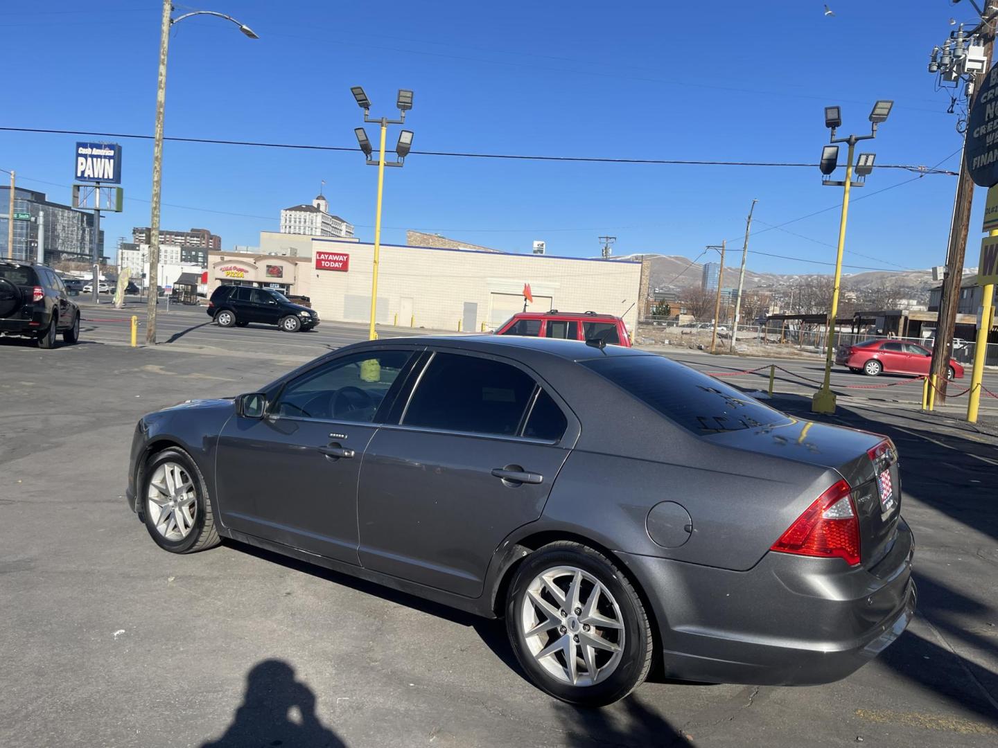 2012 Sterling Gray Metallic /Black Leather Ford Fusion SEL (3FAHP0JA4CR) with an 2.5L 4 Cyl. engine, Automatic transmission, located at 801 South State Street, Salt Lake City, UT, 84111, (801) 328-0098, 40.751953, -111.888206 - Life is crazy. Now is the time to buy! All of our prices are just dollars above our cost. These prices will change as soon as life isn't so crazy. So please call or come in. We are here to save you a lot of money! Our service department is OPEN DAILY to help with any of your service needs. P - Photo#8