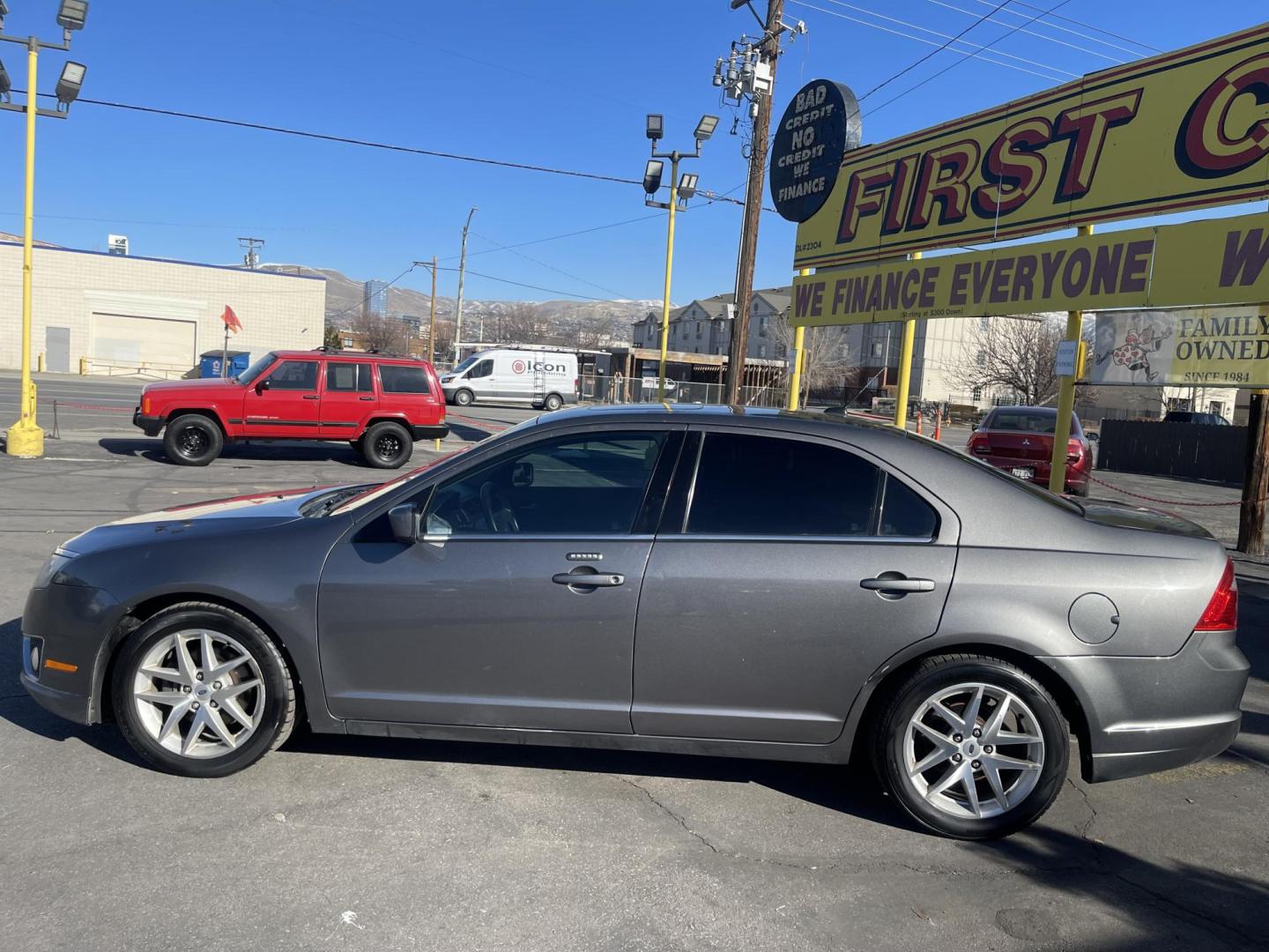 2012 Sterling Gray Metallic /Black Leather Ford Fusion SEL (3FAHP0JA4CR) with an 2.5L 4 Cyl. engine, Automatic transmission, located at 801 South State Street, Salt Lake City, UT, 84111, (801) 328-0098, 40.751953, -111.888206 - Life is crazy. Now is the time to buy! All of our prices are just dollars above our cost. These prices will change as soon as life isn't so crazy. So please call or come in. We are here to save you a lot of money! Our service department is OPEN DAILY to help with any of your service needs. P - Photo#9