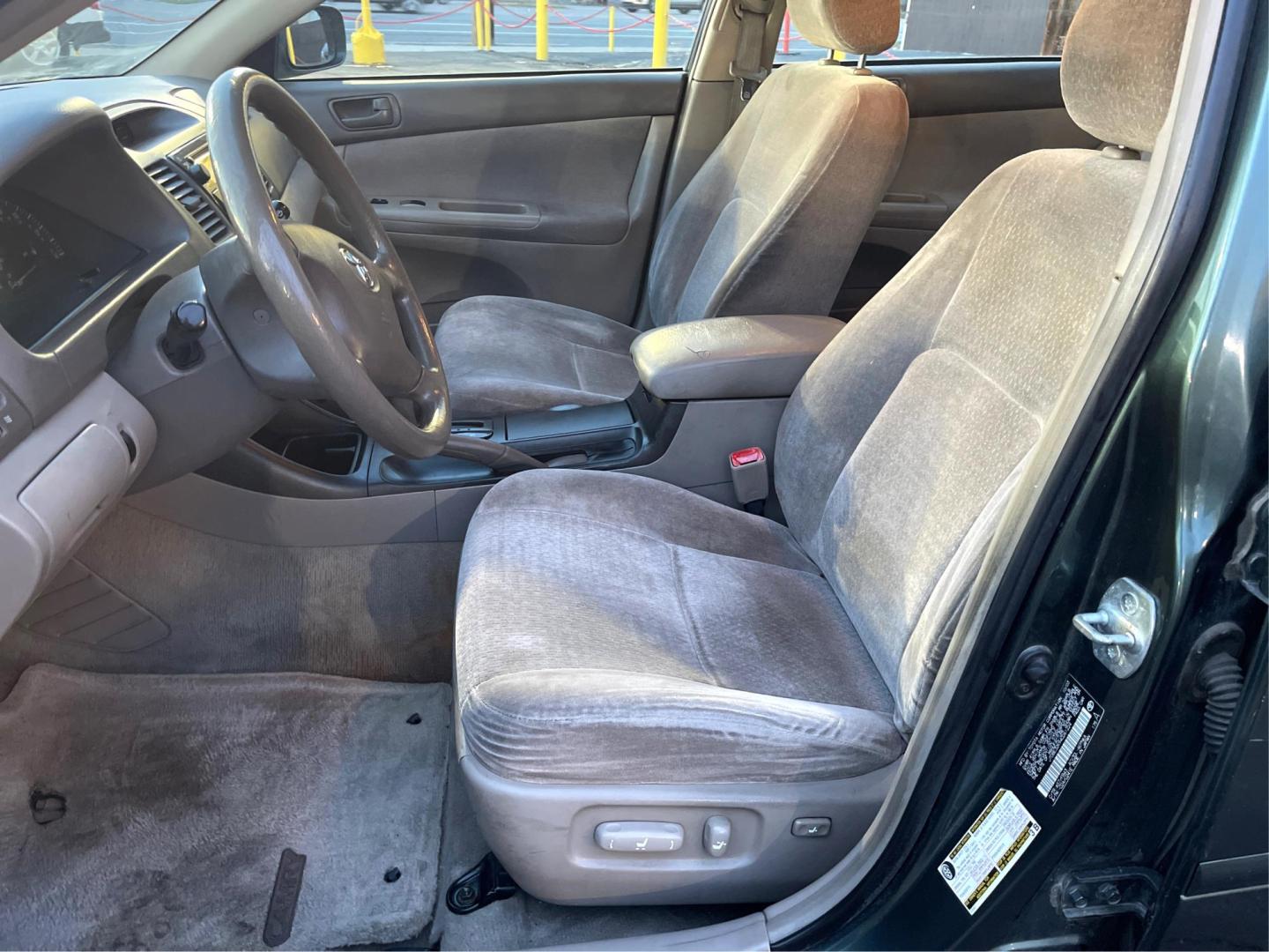 2004 Graphite Pearl /Gray Toyota Camry LE (JTDBE32K940) with an 2.4 L engine, AUTOMATIC transmission, located at 801 South State Street, Salt Lake City, UT, 84111, (801) 328-0098, 40.751953, -111.888206 - Experience reliable comfort with this 2004 Toyota Camry! It's an affordable, gently-used gem with a reputation for durability and smooth driving. Perfect for daily commutes or long trips, this Camry promises fuel efficiency and longevity. Don't miss this opportunity to drive home value! Features:AM - Photo#8