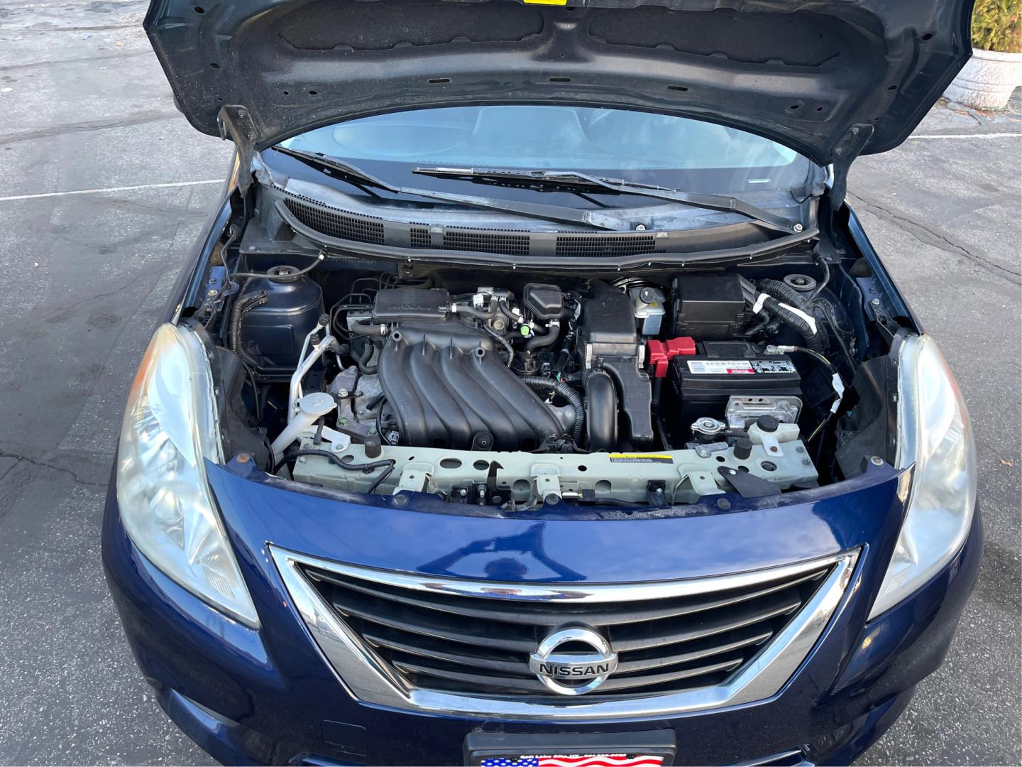 2012 Blue /Black Nissan Versa SV (3N1CN7AP9CL) with an 1.6 L 4 Cylinder engine, AUTOMATIC transmission, located at 801 South State Street, Salt Lake City, UT, 84111, (801) 328-0098, 40.751953, -111.888206 - Features: ABS Brakes, AM/FM Stereo, Air Conditioning, Automatic Transmission, Auxiliary Audio Input, Bluetooth Technology, CD Audio, Cloth Seats, Cruise Control, Overhead Airbags, Power Locks, Power Mirrors, Power Windows, Rear Defroster, Side Airbags, Traction Control Discover affordable reliabili - Photo#10