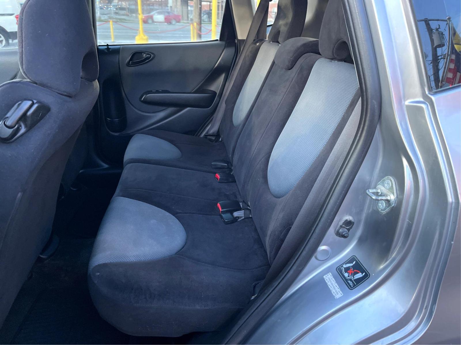 2008 Silver Sky Metallic /Black Honda Fit (JHMGD38438S) with an 1.5 L 4 Cylinder engine, AUTOMATIC transmission, located at 801 South State Street, Salt Lake City, UT, 84111, (801) 328-0098, 40.751953, -111.888206 - Experience reliable driving with this 2008 Honda Fit! Compact yet spacious, it boasts fuel-efficient performance paired with top-notch safety features. This used gem, in excellent condition, offers Honda's trusted quality at a great price. Drive off in style, economy, and peace of mind today! Fea - Photo #9