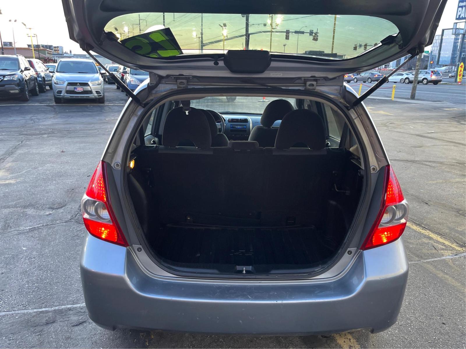 2008 Silver Sky Metallic /Black Honda Fit (JHMGD38438S) with an 1.5 L 4 Cylinder engine, AUTOMATIC transmission, located at 801 South State Street, Salt Lake City, UT, 84111, (801) 328-0098, 40.751953, -111.888206 - Experience reliable driving with this 2008 Honda Fit! Compact yet spacious, it boasts fuel-efficient performance paired with top-notch safety features. This used gem, in excellent condition, offers Honda's trusted quality at a great price. Drive off in style, economy, and peace of mind today! Fea - Photo #12