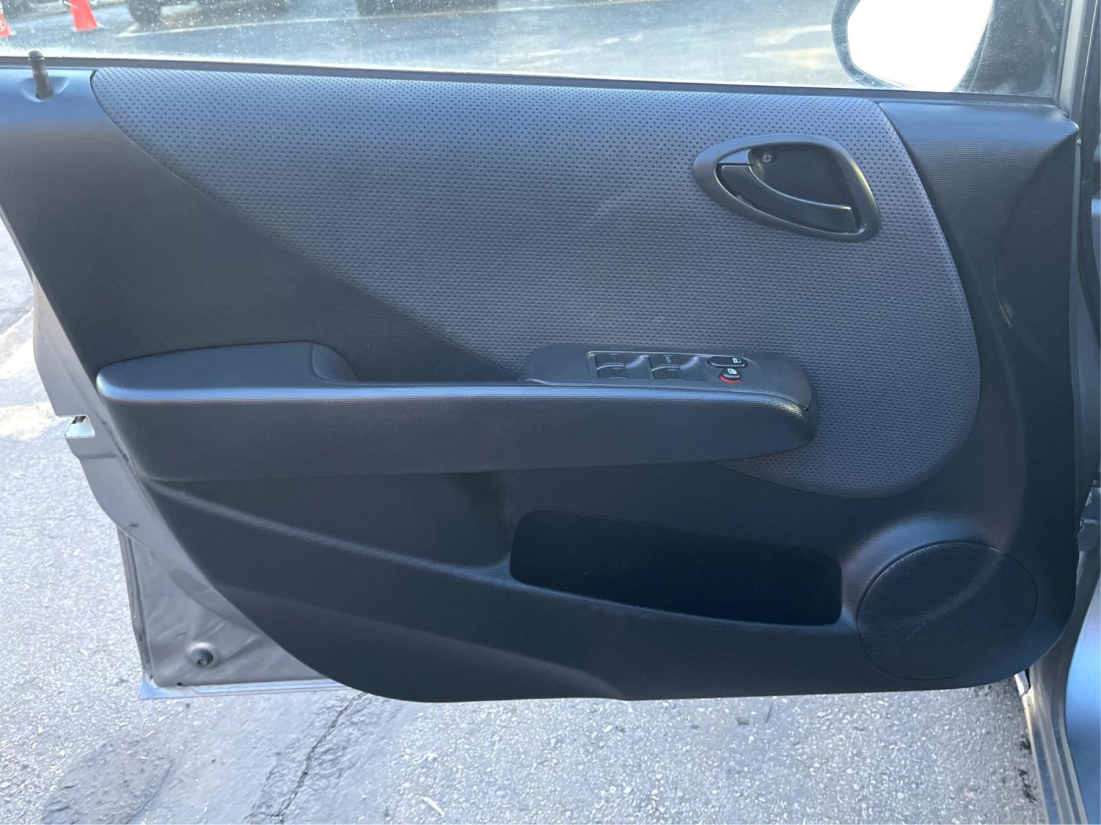 2008 Silver Sky Metallic /Black Honda Fit (JHMGD38438S) with an 1.5 L 4 Cylinder engine, AUTOMATIC transmission, located at 801 South State Street, Salt Lake City, UT, 84111, (801) 328-0098, 40.751953, -111.888206 - Experience reliable driving with this 2008 Honda Fit! Compact yet spacious, it boasts fuel-efficient performance paired with top-notch safety features. This used gem, in excellent condition, offers Honda's trusted quality at a great price. Drive off in style, economy, and peace of mind today! Fea - Photo #19