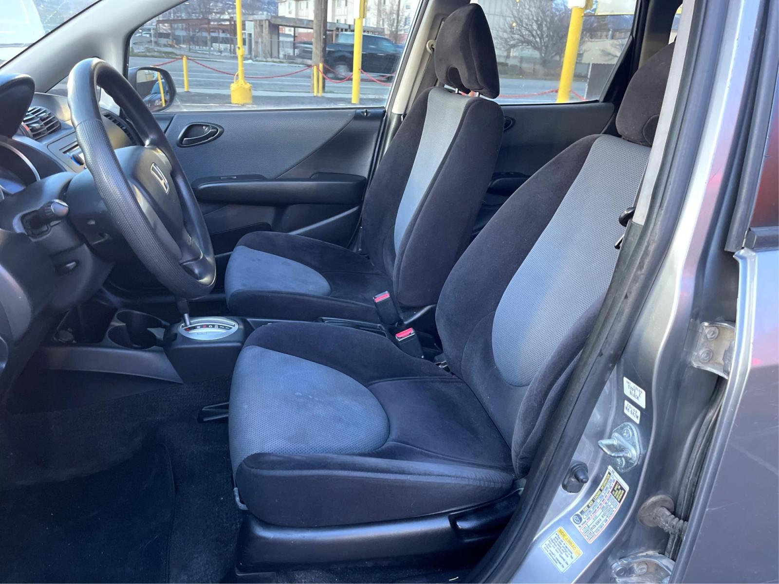 2008 Silver Sky Metallic /Black Honda Fit (JHMGD38438S) with an 1.5 L 4 Cylinder engine, AUTOMATIC transmission, located at 801 South State Street, Salt Lake City, UT, 84111, (801) 328-0098, 40.751953, -111.888206 - Experience reliable driving with this 2008 Honda Fit! Compact yet spacious, it boasts fuel-efficient performance paired with top-notch safety features. This used gem, in excellent condition, offers Honda's trusted quality at a great price. Drive off in style, economy, and peace of mind today! Fea - Photo #8