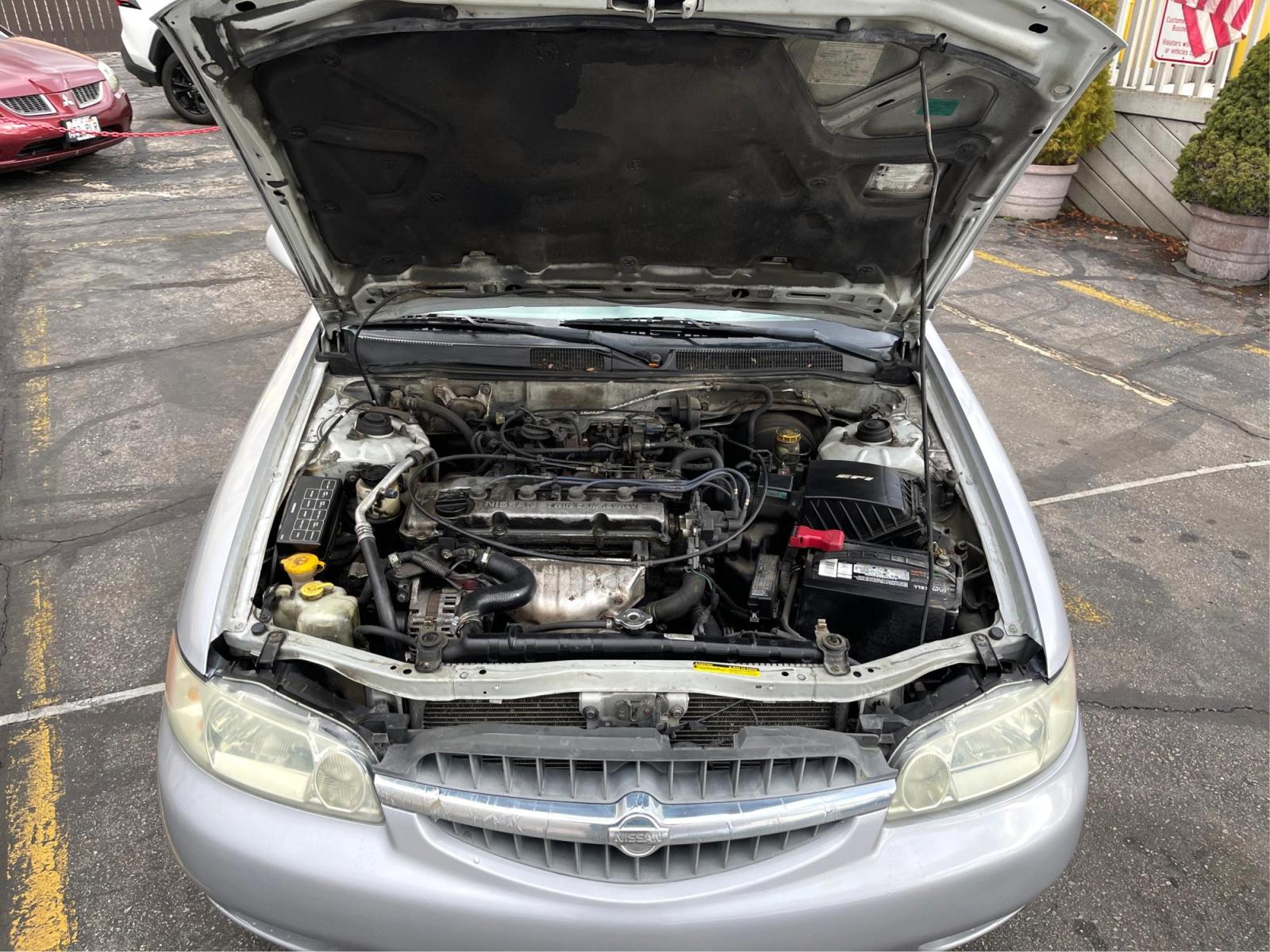 2001 Silver Sky Metallic /Gray Nissan Altima GXE (1N4DL01DX1C) with an 2.4 L 4 Cylinder engine, AUTOMATIC transmission, located at 801 South State Street, Salt Lake City, UT, 84111, (801) 328-0098, 40.751953, -111.888206 - Features:AM/FM Stereo, Air Conditioning, Automatic Transmission, CD Audio, Cloth Seats, Cruise Control, Limited Edition, Power Locks, Power Mirrors, Power Seat(s), Power Windows, Rear Defroster "Immerse yourself in a delightful driving experience with this 2001 Nissan Altima. Adds reliability and - Photo #10