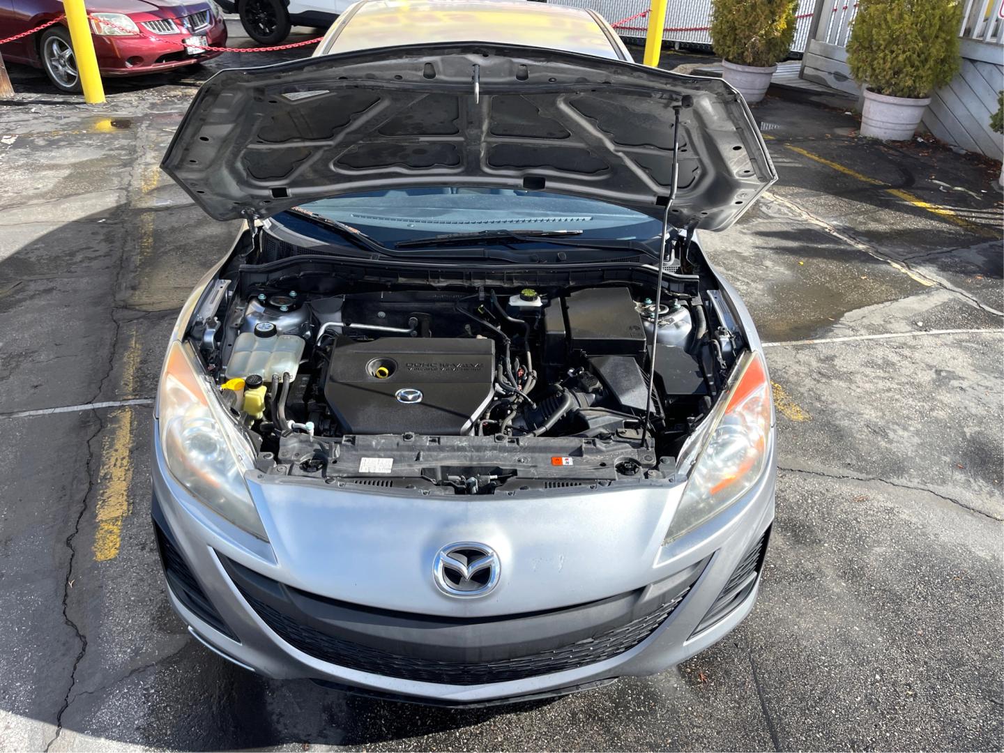 2010 Platinum Gray Metallic /Black Mazda MAZDA3 i (JM1BL1SF6A1) with an 2.0 Liter 4 Cylinder engine, Manual transmission, located at 801 South State Street, Salt Lake City, UT, 84111, (801) 328-0098, 40.751953, -111.888206 - Features: ABS Brakes, AM/FM Stereo, Air Conditioning, Alloy Wheels, Auxiliary Audio Input, Bluetooth Technology, CD Audio, Cloth Seats, Cruise Control, Overhead Airbags, Power Locks, Power Mirrors, Power Windows, Rear Defroster, Side Airbags, Touring Package, Traction Control - Photo#8