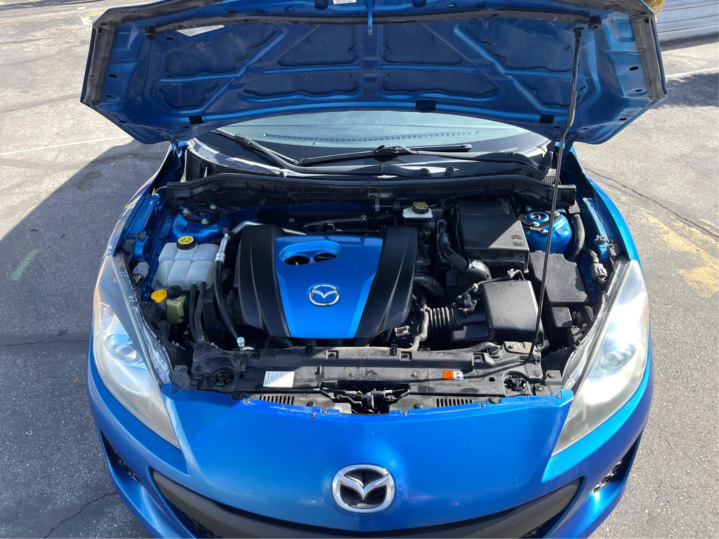 2012 Blue /BLACK Mazda MAZDA3 3 I Grand Touring (JM1BL1M78C1) with an 2.0 Liter 4 Cylinder engine, AUTOMATIC transmission, located at 801 South State Street, Salt Lake City, UT, 84111, (801) 328-0098, 40.751953, -111.888206 - "Get yourself into this exquisite 2012 Mazda MAZDA3! With impeccable handling, attractive design, great fuel efficiency, and top-notch safety features, it delivers an unmatched driving experience. Low mileage with a great price tag - It’s pre-owned, not pre-loved!" Features Top Features: Alloy W - Photo#10