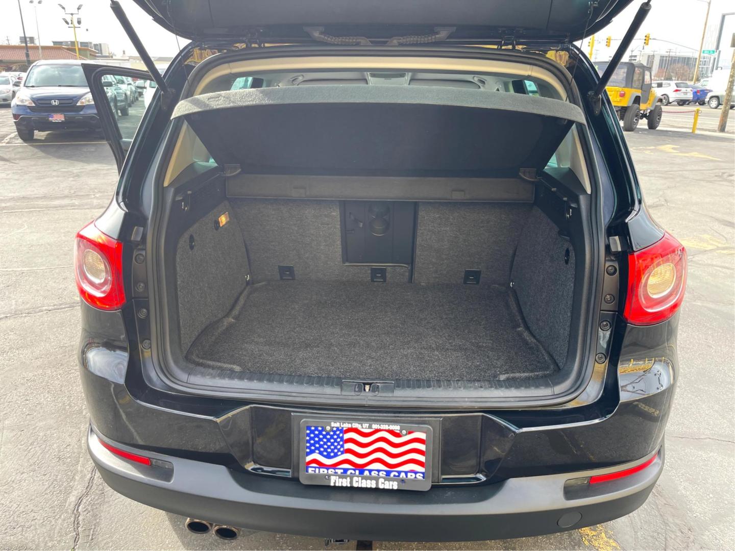 2009 Black /BLACK Volkswagen Tiguan SEL (WVGBV75N29W) with an 2.0L engine, AUTOMATIC transmission, located at 801 South State Street, Salt Lake City, UT, 84111, (801) 328-0098, 40.751953, -111.888206 - Features Top Features: 4WD/AWD, Navigation System, Alloy Wheels, Rear View Camera, Dynaudio, Satellite Radio Ready, Front Seat Heaters, Tow Hitch, Leather Seats, Turbo Charged Engine, Memory Seat(s) Basic Features: ABS Brakes, Auxiliary Audio Input, Power Locks, Rear Defroster, AM/FM Stereo, CD Au - Photo#12