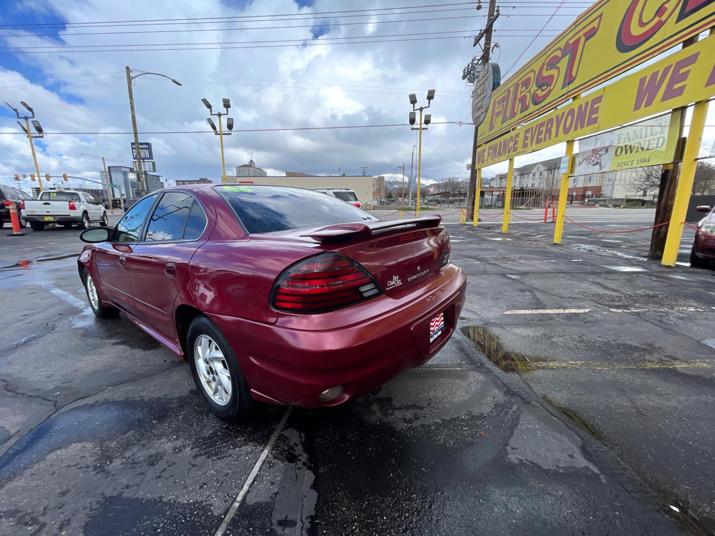 2004 Salsa Red Pearl /Gray Pontiac Grand AM SE (1G2NF52E74M) with an 3.4Liter V6 engine, Automatic transmission, located at 801 South State Street, Salt Lake City, UT, 84111, (801) 328-0098, 40.751953, -111.888206 - Top Features: Alloy Wheels, Cloth Seats, ABS Brakes, CD Audio, Power Seat(s), Traction Control, AM/FM Stereo, Cruise Control, Power Windows, Air Conditioning, Power Locks, Rear Defroster, Automatic Transmission, Power Mirrors, Rear Spoiler - Photo#5