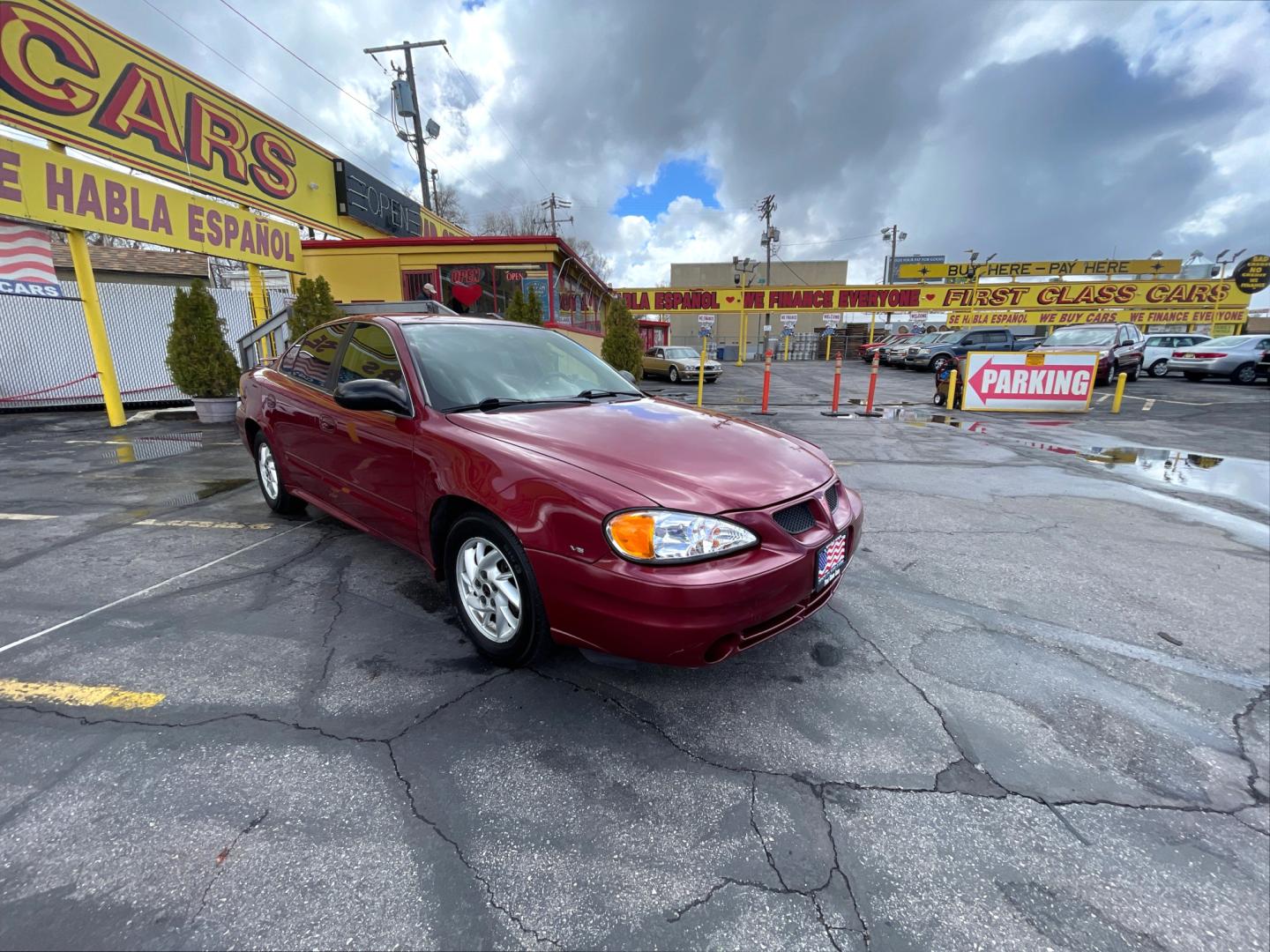 2004 Salsa Red Pearl /Gray Pontiac Grand AM SE (1G2NF52E74M) with an 3.4Liter V6 engine, Automatic transmission, located at 801 South State Street, Salt Lake City, UT, 84111, (801) 328-0098, 40.751953, -111.888206 - Top Features: Alloy Wheels, Cloth Seats, ABS Brakes, CD Audio, Power Seat(s), Traction Control, AM/FM Stereo, Cruise Control, Power Windows, Air Conditioning, Power Locks, Rear Defroster, Automatic Transmission, Power Mirrors, Rear Spoiler - Photo#7