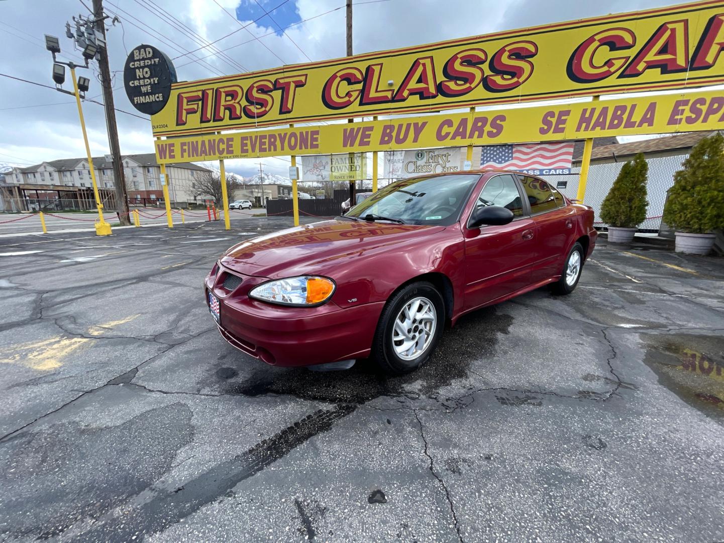 2004 Salsa Red Pearl /Gray Pontiac Grand AM SE (1G2NF52E74M) with an 3.4Liter V6 engine, Automatic transmission, located at 801 South State Street, Salt Lake City, UT, 84111, (801) 328-0098, 40.751953, -111.888206 - Top Features: Alloy Wheels, Cloth Seats, ABS Brakes, CD Audio, Power Seat(s), Traction Control, AM/FM Stereo, Cruise Control, Power Windows, Air Conditioning, Power Locks, Rear Defroster, Automatic Transmission, Power Mirrors, Rear Spoiler - Photo#0