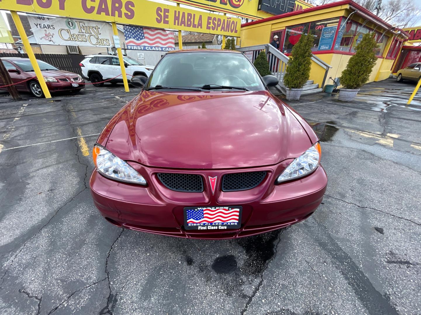 2004 Salsa Red Pearl /Gray Pontiac Grand AM SE (1G2NF52E74M) with an 3.4Liter V6 engine, Automatic transmission, located at 801 South State Street, Salt Lake City, UT, 84111, (801) 328-0098, 40.751953, -111.888206 - Top Features: Alloy Wheels, Cloth Seats, ABS Brakes, CD Audio, Power Seat(s), Traction Control, AM/FM Stereo, Cruise Control, Power Windows, Air Conditioning, Power Locks, Rear Defroster, Automatic Transmission, Power Mirrors, Rear Spoiler - Photo#1