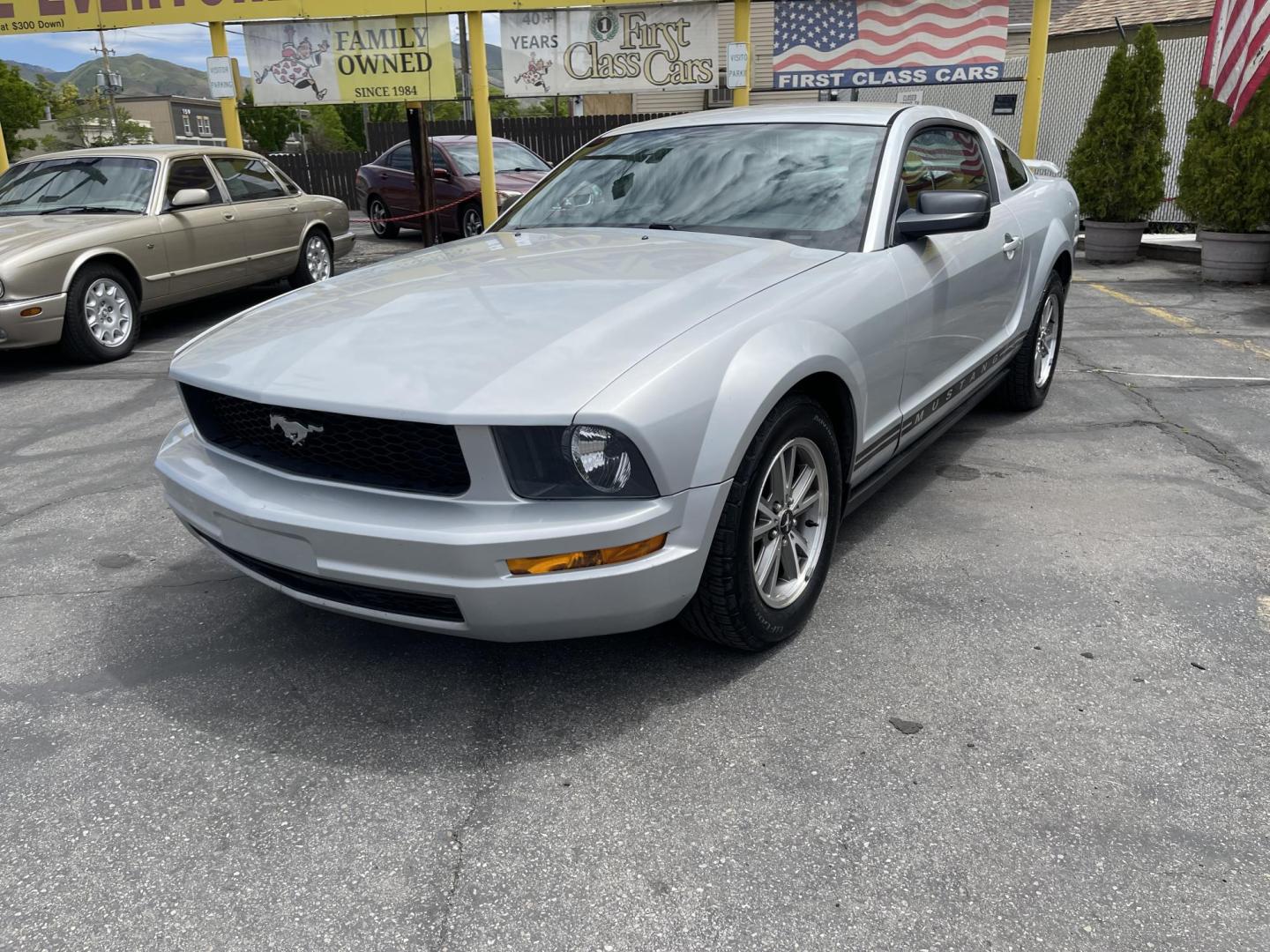 2005 Silver Sky Metallic /Black Ford Mustang Base (1ZVFT80N055) with an 4.0 L V6 engine, Automatic transmission, located at 801 South State Street, Salt Lake City, UT, 84111, (801) 328-0098, 40.751953, -111.888206 - Clean title! no rebuilt restored nice Mustang hard to find! Must see!!! Features: Alloy Wheels, Cloth Seats, ABS Brakes, Automatic Transmission, Power Locks, Power Windows, AM/FM Stereo, CD Audio, Power Mirrors, Rear Defroster, Air Conditioning, Cruise Control, Power Seat(s), Rear Spoiler - Photo#2