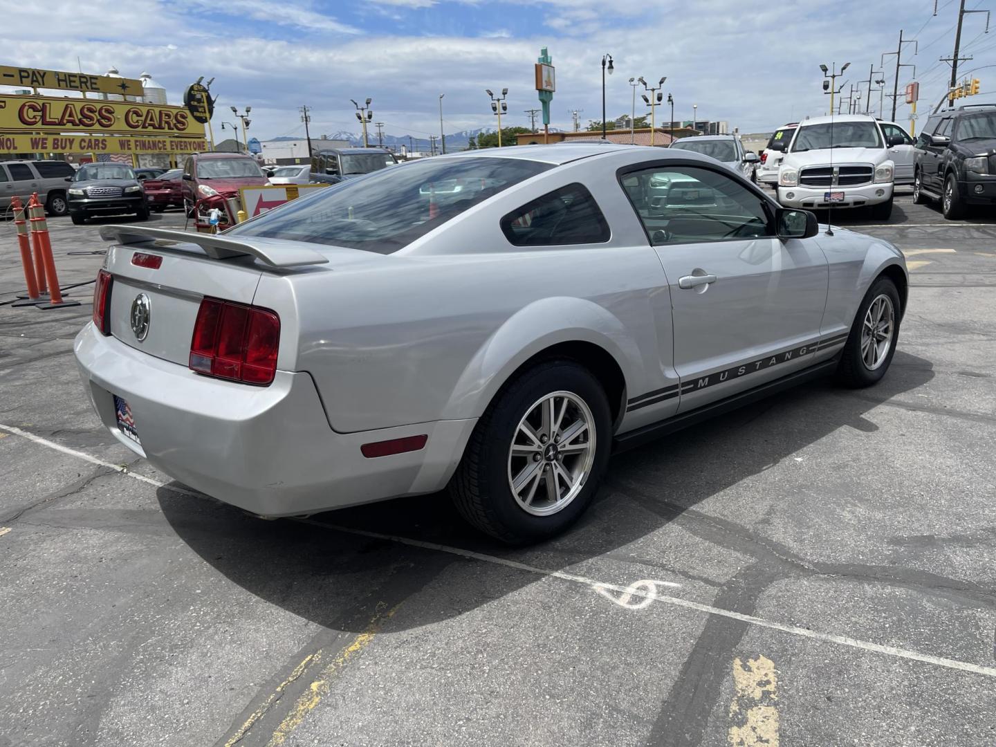 2005 Silver Sky Metallic /Black Ford Mustang Base (1ZVFT80N055) with an 4.0 L V6 engine, Automatic transmission, located at 801 South State Street, Salt Lake City, UT, 84111, (801) 328-0098, 40.751953, -111.888206 - Clean title! no rebuilt restored nice Mustang hard to find! Must see!!! Features: Alloy Wheels, Cloth Seats, ABS Brakes, Automatic Transmission, Power Locks, Power Windows, AM/FM Stereo, CD Audio, Power Mirrors, Rear Defroster, Air Conditioning, Cruise Control, Power Seat(s), Rear Spoiler - Photo#5