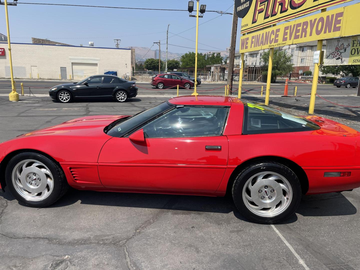 1996 Salsa Red Pearl /Black Chevrolet Corvette Coupe (1G1YY22P0T5) with an 5.7L V8 OHV 12V engine, Automatic transmission, located at 801 South State Street, Salt Lake City, UT, 84111, (801) 328-0098, 40.751953, -111.888206 - 1 Owner car! Immaculate condition! Super low miles! No accidents on the Carfax history report. 1 owner very clean!!! Immaculate condition for the year make and miles! A must see for Corvette collectors and enthusiasts. Hard car to find. Features: Alloy Wheels, Leather Seats, ABS Brakes, Automatic - Photo#13