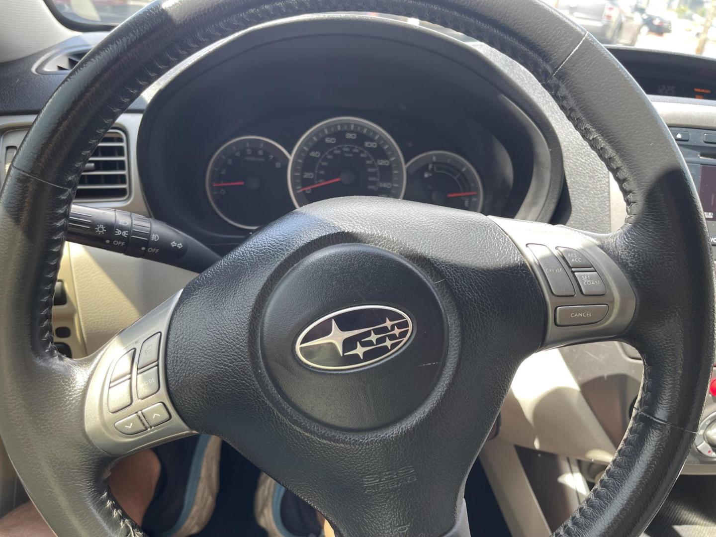 2010 /Tan Subaru Impreza 2.5i Premium 4-Door (JF1GE6B6XAH) with an 2.5L H4 SOHC 16V engine, Automatic transmission, located at 801 South State Street, Salt Lake City, UT, 84111, (801) 328-0098, 40.751953, -111.888206 - Features: 4WD/AWD, Cloth Seats, Satellite Radio Ready, Sunroof(s), ABS Brakes, CD Audio, Power Mirrors, Traction Control, AM/FM Stereo, Cruise Control, Power Windows, Air Conditioning, Overhead Airbags, Rear Defroster, Automatic Transmission, Power Locks, Side Airbags - Photo#21