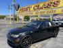 2005 /Black BMW 3-Series 325Ci convertible (WBABW33495P) with an 2.5L L6 DOHC 24V engine, Automatic transmission, located at 801 South State Street, Salt Lake City, UT, 84111, (801) 328-0098, 40.751953, -111.888206 - Features: Alloy Wheels, Leather Seats, Front Seat Heaters, Memory Seat(s), Harman Kardon Sound, Soft Top, ABS Brakes, CD Audio, Power Seat(s), Traction Control, AM/FM Stereo, Cruise Control, Power Windows, Air Conditioning, Power Locks, Rear Defroster, Automatic Transmission, Power Mirrors, Side Air - Photo#0