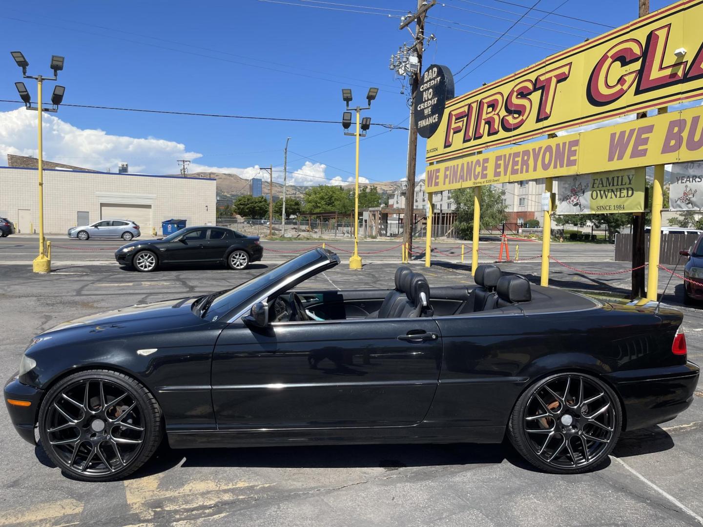 2005 /Black BMW 3-Series 325Ci convertible (WBABW33495P) with an 2.5L L6 DOHC 24V engine, Automatic transmission, located at 801 South State Street, Salt Lake City, UT, 84111, (801) 328-0098, 40.751953, -111.888206 - Features: Alloy Wheels, Leather Seats, Front Seat Heaters, Memory Seat(s), Harman Kardon Sound, Soft Top, ABS Brakes, CD Audio, Power Seat(s), Traction Control, AM/FM Stereo, Cruise Control, Power Windows, Air Conditioning, Power Locks, Rear Defroster, Automatic Transmission, Power Mirrors, Side Air - Photo#14