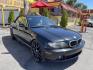 2005 /Black BMW 3-Series 325Ci convertible (WBABW33495P) with an 2.5L L6 DOHC 24V engine, Automatic transmission, located at 801 South State Street, Salt Lake City, UT, 84111, (801) 328-0098, 40.751953, -111.888206 - Features: Alloy Wheels, Leather Seats, Front Seat Heaters, Memory Seat(s), Harman Kardon Sound, Soft Top, ABS Brakes, CD Audio, Power Seat(s), Traction Control, AM/FM Stereo, Cruise Control, Power Windows, Air Conditioning, Power Locks, Rear Defroster, Automatic Transmission, Power Mirrors, Side Air - Photo#3