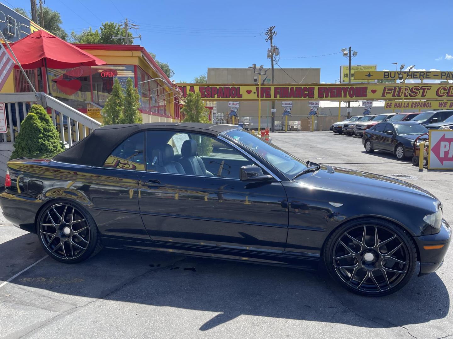 2005 /Black BMW 3-Series 325Ci convertible (WBABW33495P) with an 2.5L L6 DOHC 24V engine, Automatic transmission, located at 801 South State Street, Salt Lake City, UT, 84111, (801) 328-0098, 40.751953, -111.888206 - Features: Alloy Wheels, Leather Seats, Front Seat Heaters, Memory Seat(s), Harman Kardon Sound, Soft Top, ABS Brakes, CD Audio, Power Seat(s), Traction Control, AM/FM Stereo, Cruise Control, Power Windows, Air Conditioning, Power Locks, Rear Defroster, Automatic Transmission, Power Mirrors, Side Air - Photo#4