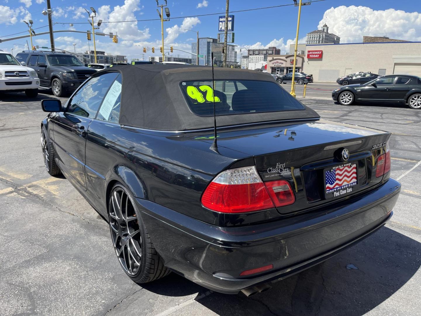 2005 /Black BMW 3-Series 325Ci convertible (WBABW33495P) with an 2.5L L6 DOHC 24V engine, Automatic transmission, located at 801 South State Street, Salt Lake City, UT, 84111, (801) 328-0098, 40.751953, -111.888206 - Features: Alloy Wheels, Leather Seats, Front Seat Heaters, Memory Seat(s), Harman Kardon Sound, Soft Top, ABS Brakes, CD Audio, Power Seat(s), Traction Control, AM/FM Stereo, Cruise Control, Power Windows, Air Conditioning, Power Locks, Rear Defroster, Automatic Transmission, Power Mirrors, Side Air - Photo#8