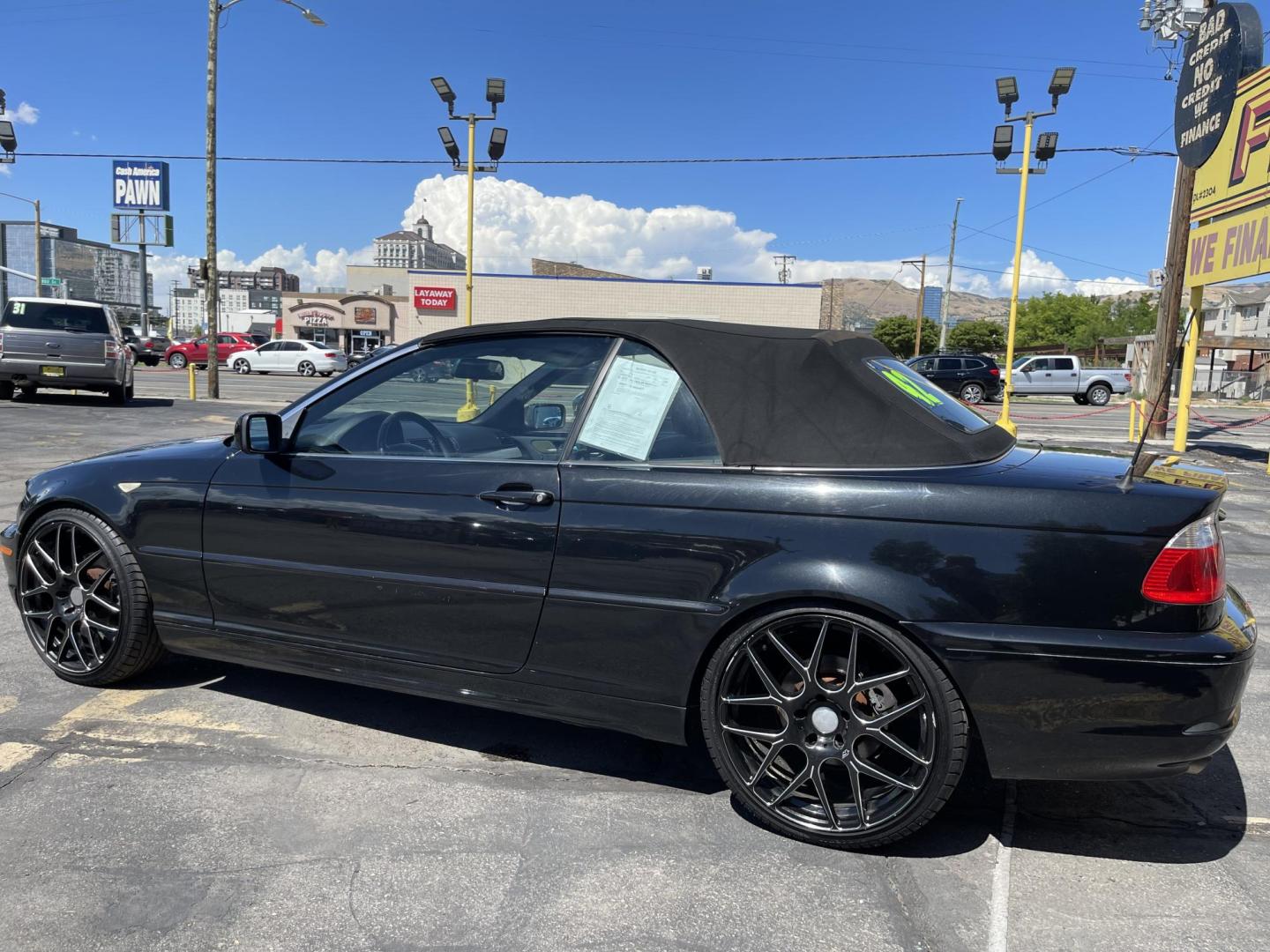 2005 /Black BMW 3-Series 325Ci convertible (WBABW33495P) with an 2.5L L6 DOHC 24V engine, Automatic transmission, located at 801 South State Street, Salt Lake City, UT, 84111, (801) 328-0098, 40.751953, -111.888206 - Features: Alloy Wheels, Leather Seats, Front Seat Heaters, Memory Seat(s), Harman Kardon Sound, Soft Top, ABS Brakes, CD Audio, Power Seat(s), Traction Control, AM/FM Stereo, Cruise Control, Power Windows, Air Conditioning, Power Locks, Rear Defroster, Automatic Transmission, Power Mirrors, Side Air - Photo#9